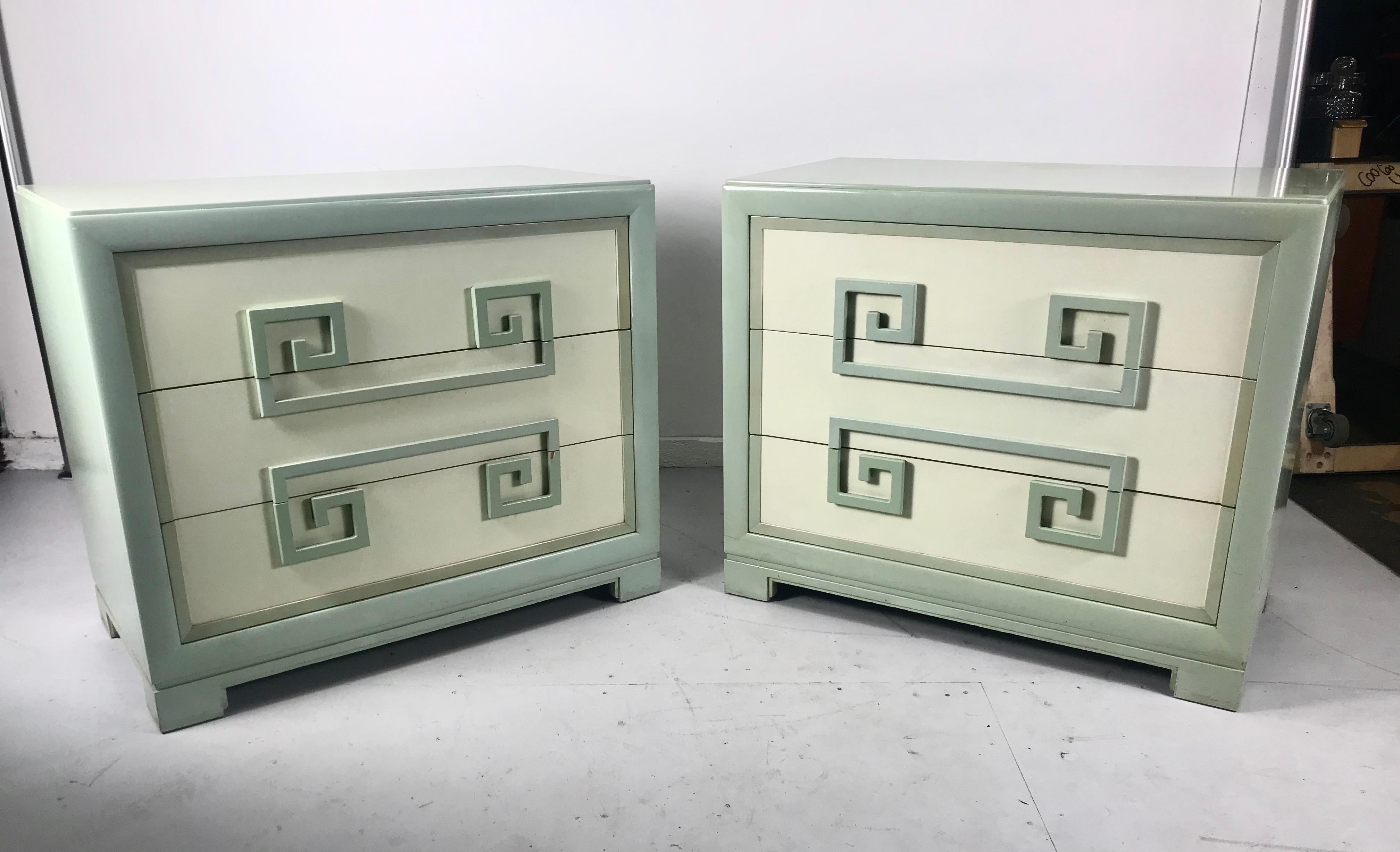 Fabulous pair of oversized chest of drawers/ dresser manufactured by Kittinger from their earliest Mandarin collection with bold Greek key drawer handles. Retains original two-tone lacquer finish in nice original condition. Minor paint / veneer