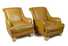 Pair of 1940s Leather Club Chairs with Parchment-Covered Wood Legs, France