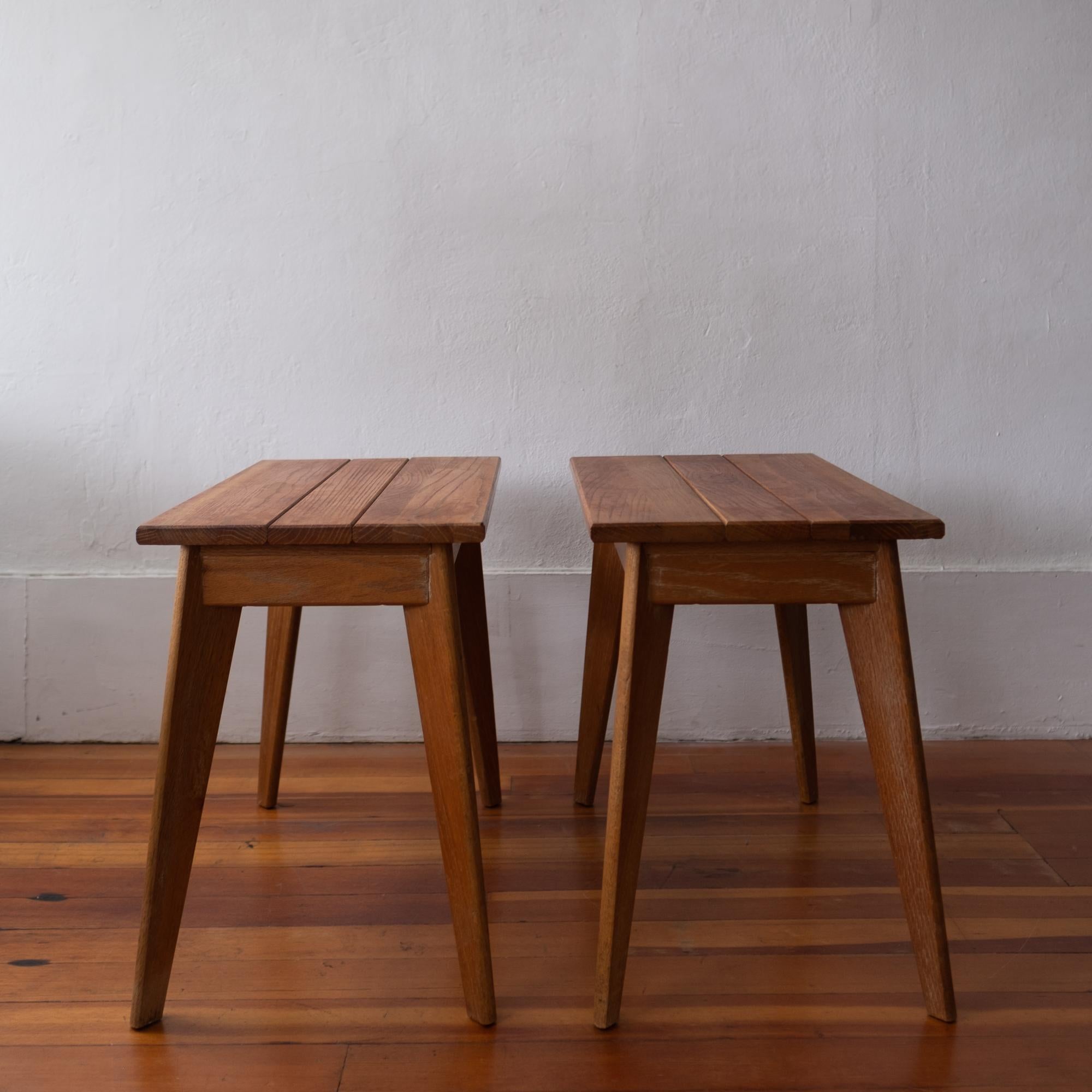 A pair of limed oak end tables or nightstands from the 1940s. Great design with a beautiful patina.