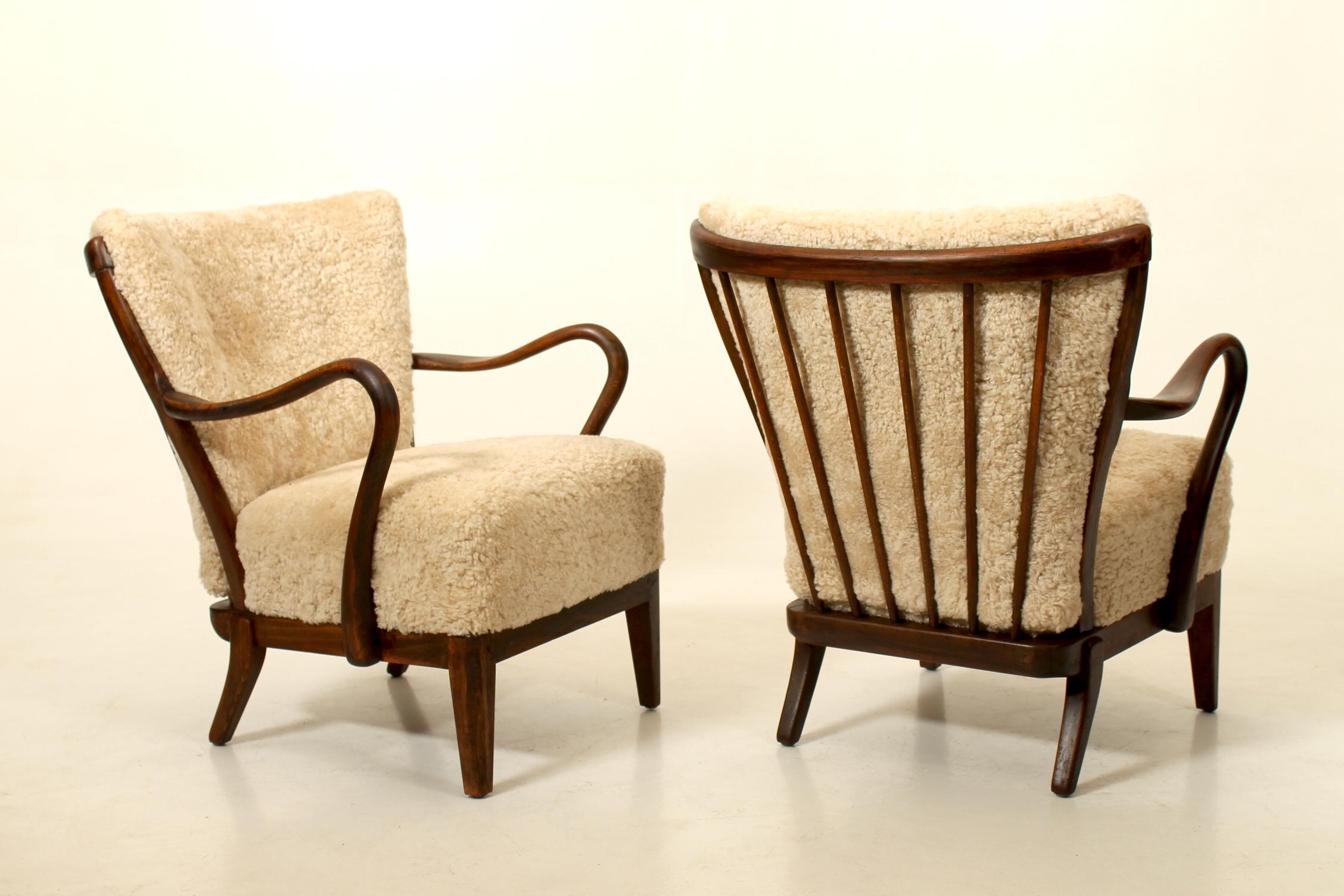 Stained Pair of 1940s lounge chairs by Alfred Christensen, Denmark. For Sale