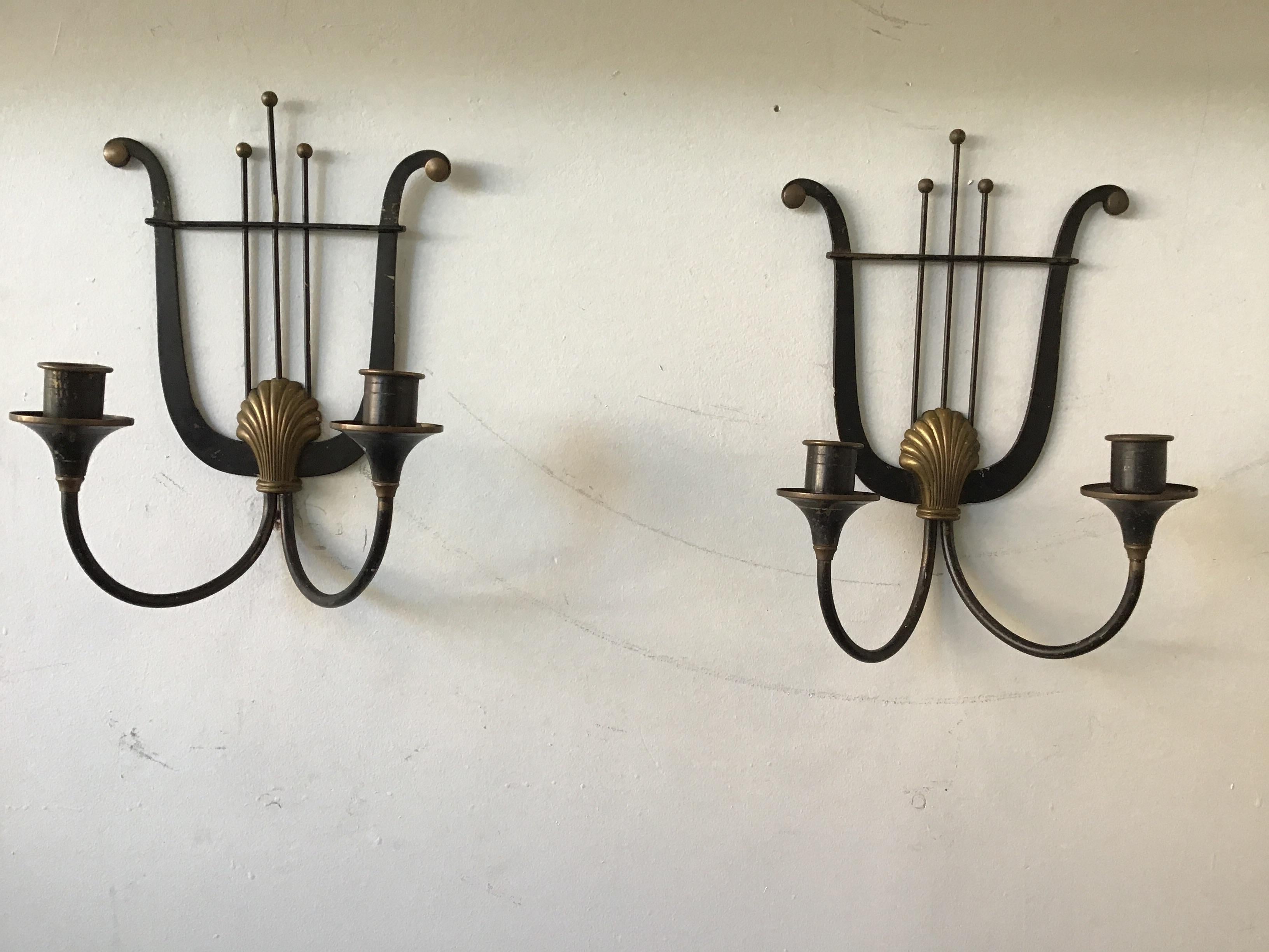 Pair of 1940s iron and brass lyre sconces.