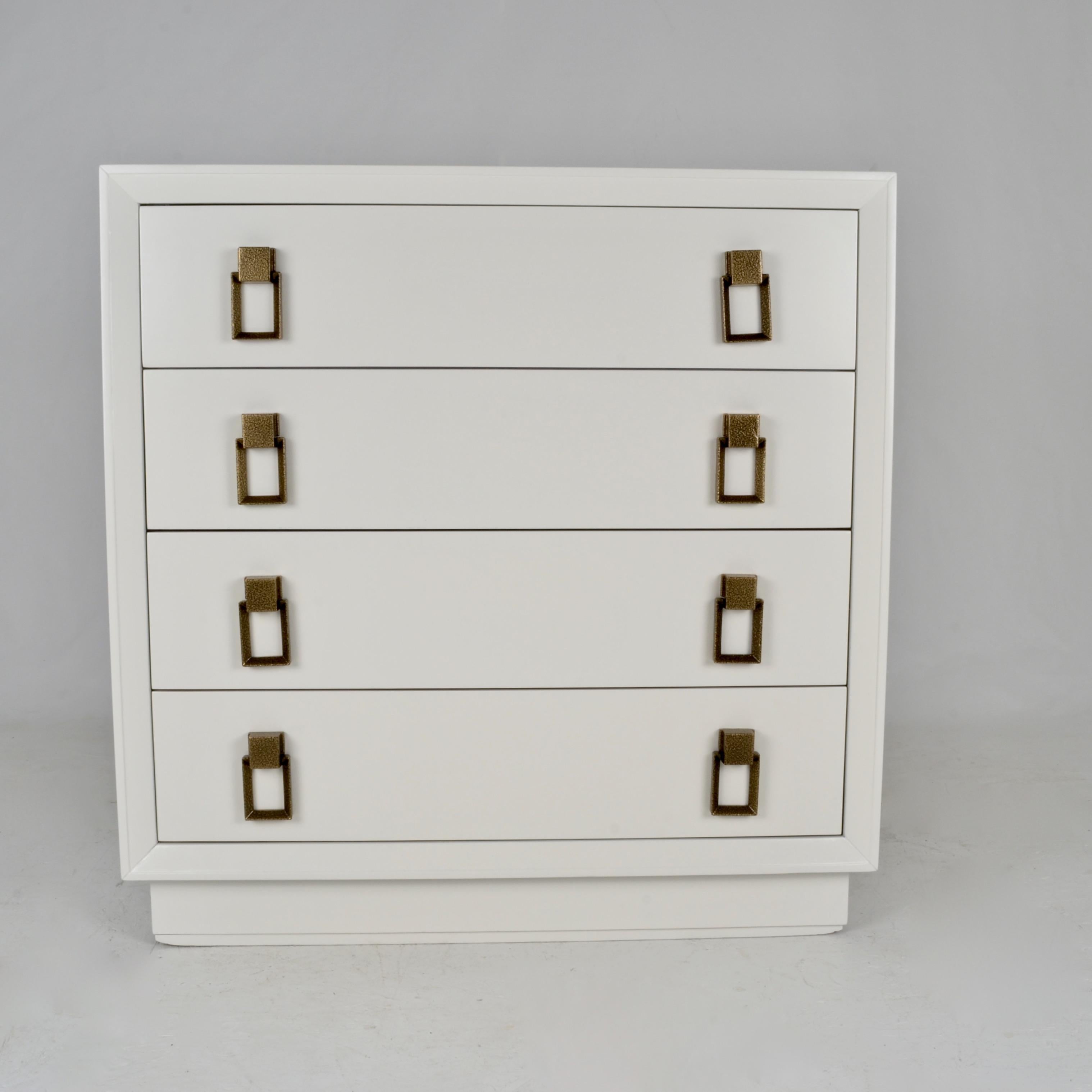 Newly lacquered in satin finish dove white with original pulls powder coated in a custom hammered brass finish. Each chest has 4 drawers. Drawers have been clear coated over mahogany. Nice size in very Fine restored condition.