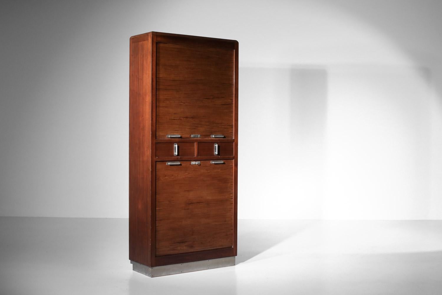 Mid-Century Modern Pair of 1940s modernist solid wood shutter cabinets For Sale