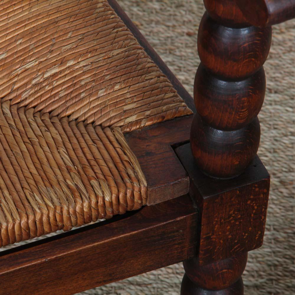 Pair of 1940s oak and straw armchairs Bon état - En vente à MONTESSON, FR