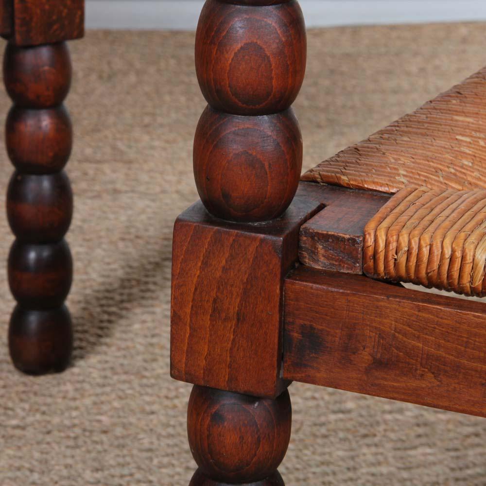 Milieu du XXe siècle Pair of 1940s oak and straw armchairs en vente