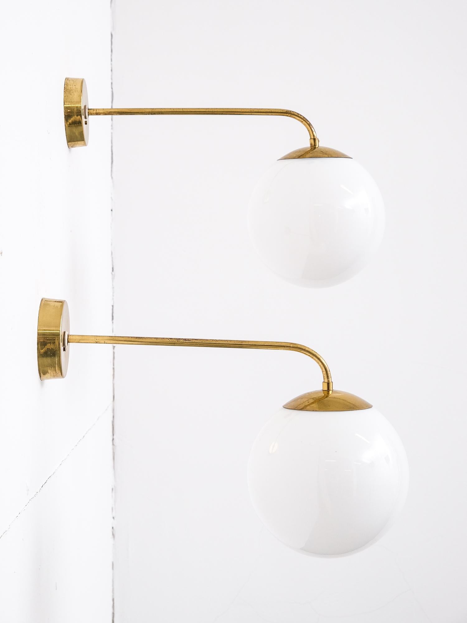 Scandinavian Modern Pair of 1940s Opaline Glass and Brass Wall Lamps by Idman, Finland