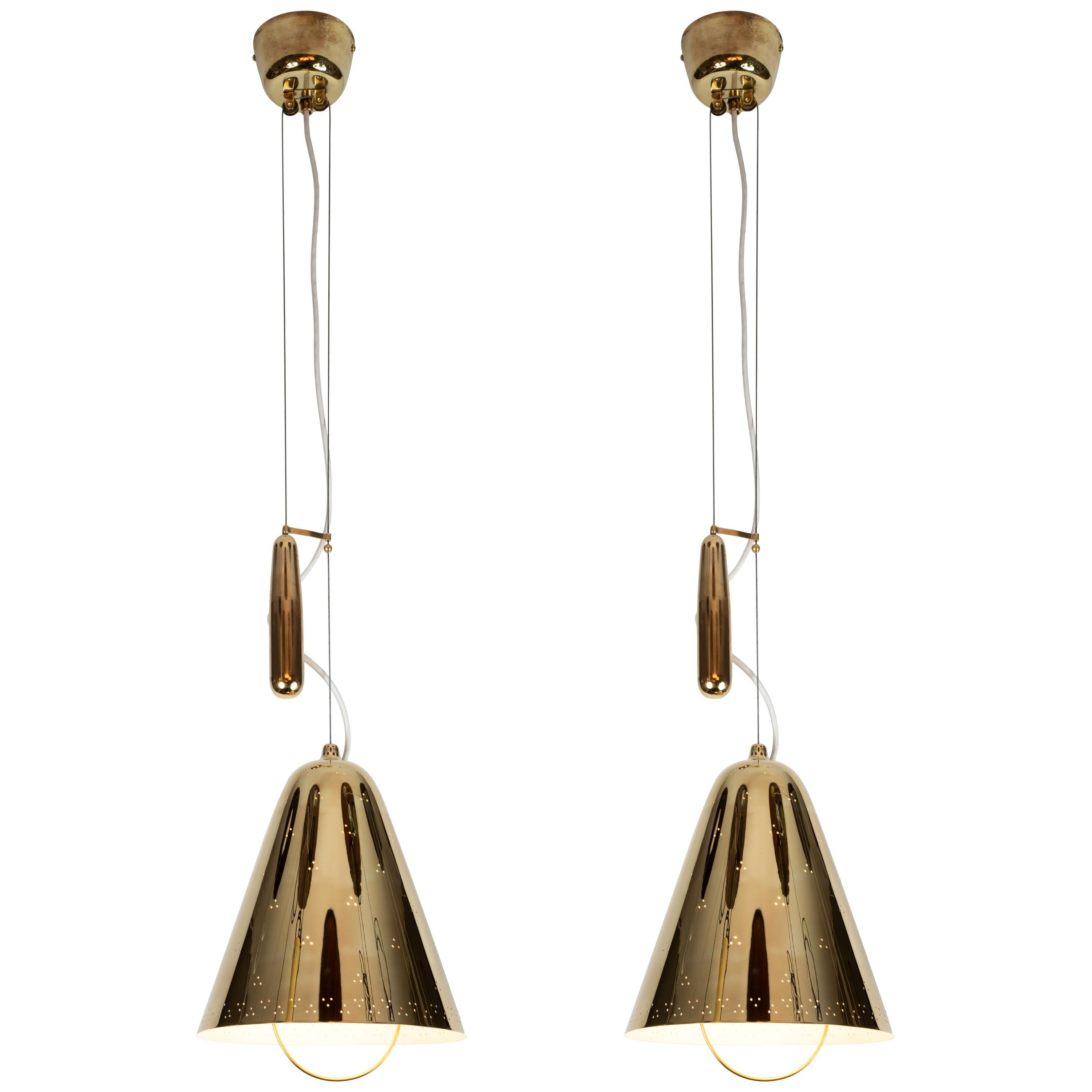 Pair of 1940s Paavo Tynell 
A1942
 Counterweight Pendants for Taito Oy