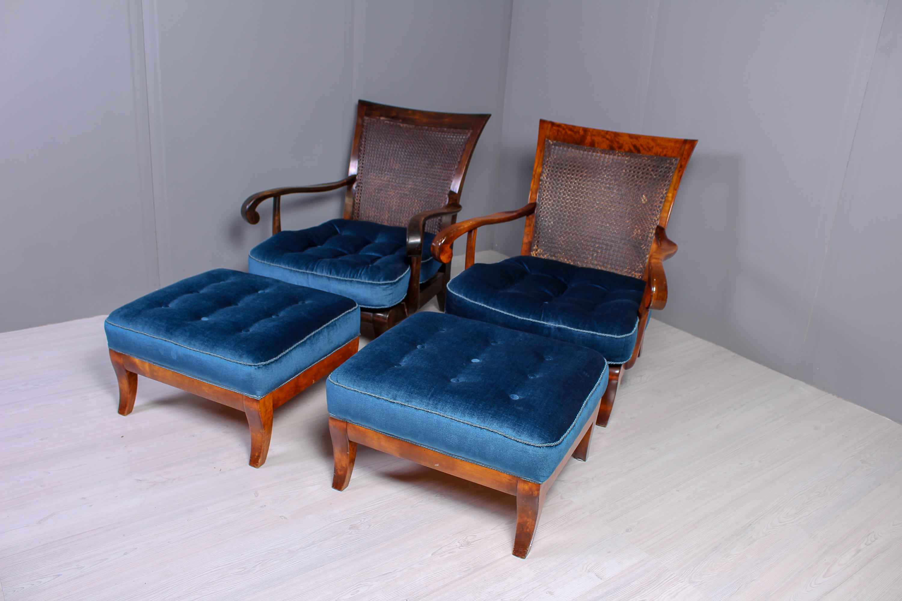 A great set of lounge chairs and ottomans made in Scandinavia in the 1940s. The chairs are elegantly designed with rattan backs and nice curves. Chairs and ottomans are upholstered in a high quality blue velvet fabric which is in excellent vintage