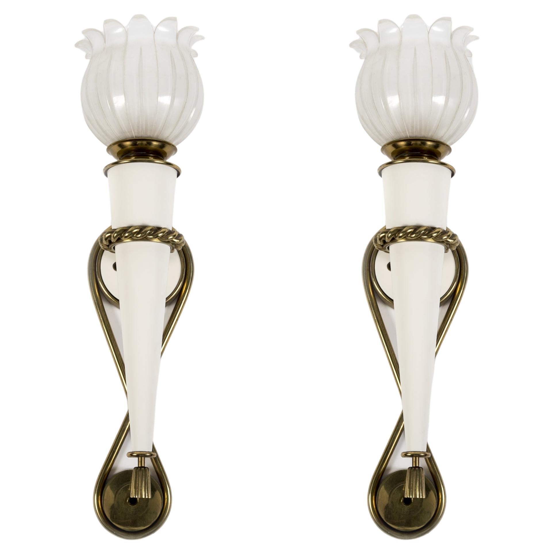 Pair of 1940's sconces in the style of Gilbert Poillerat For Sale