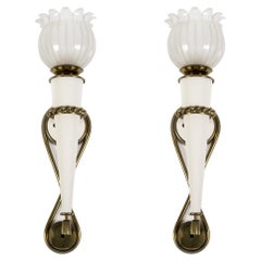 Pair of 1940's sconces in the style of Gilbert Poillerat