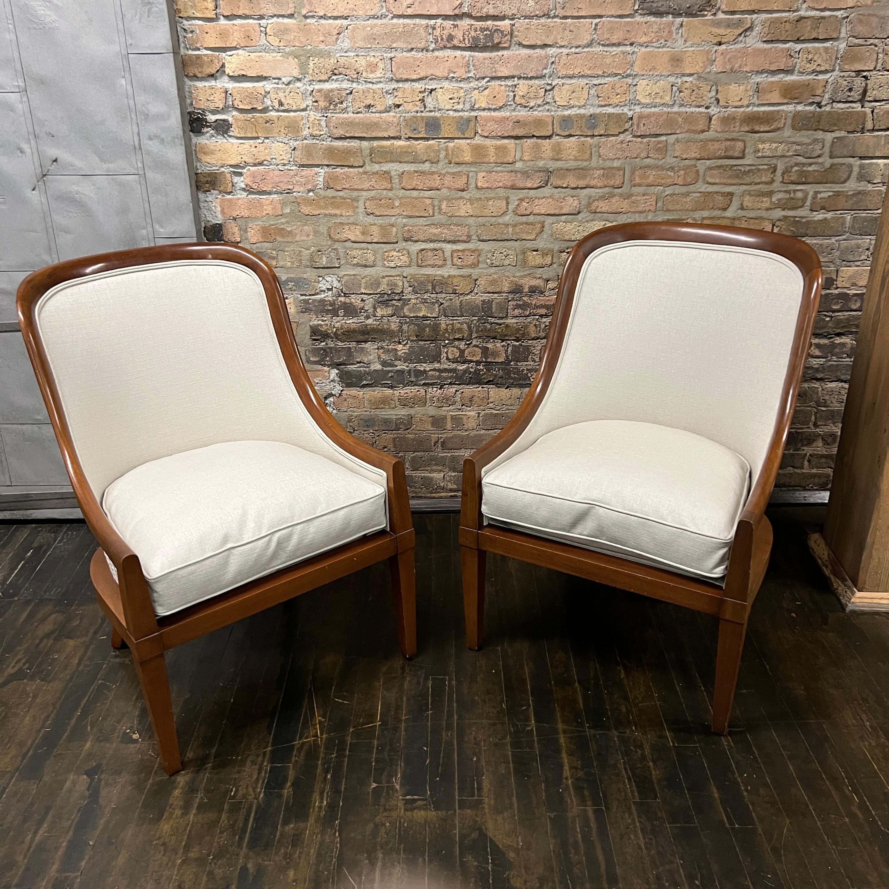 These gorgeous chairs have lovely solid walnut frames and very light gray linen upholstery (on the front of the chair and the seat cushions).  The seat cushions are down filled.  The back of the chair is upholstered in a coordinating cut velvet that