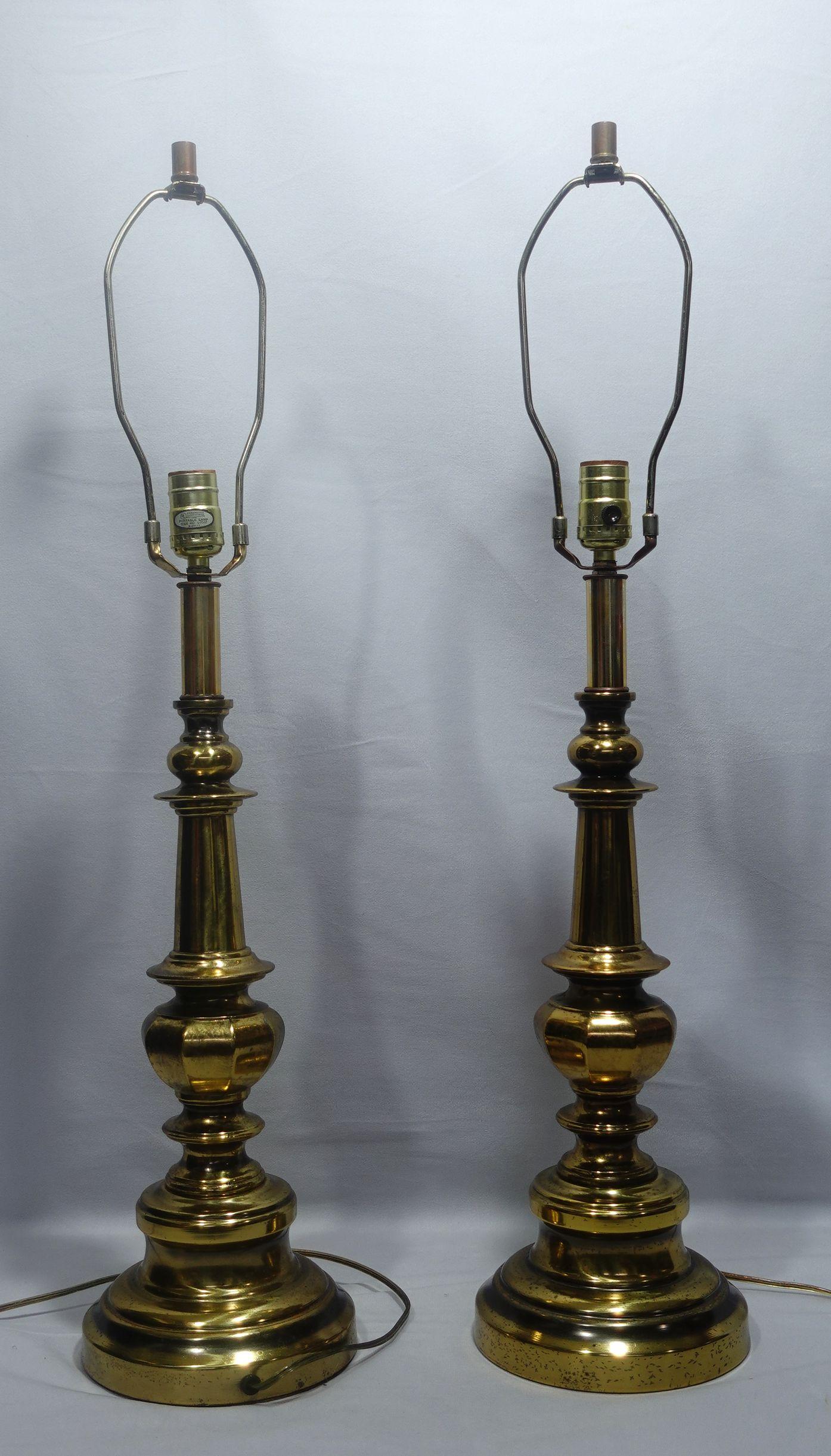 A tall Pair of 1940s Stiffel Brass table lamps Tested in good working condition.



 