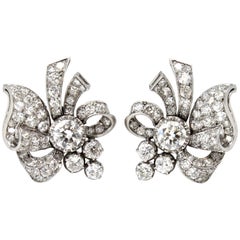 Pair of 1940s Vintage Platinum and 3.50 Carat Diamond Clip Earrings with Scrolls
