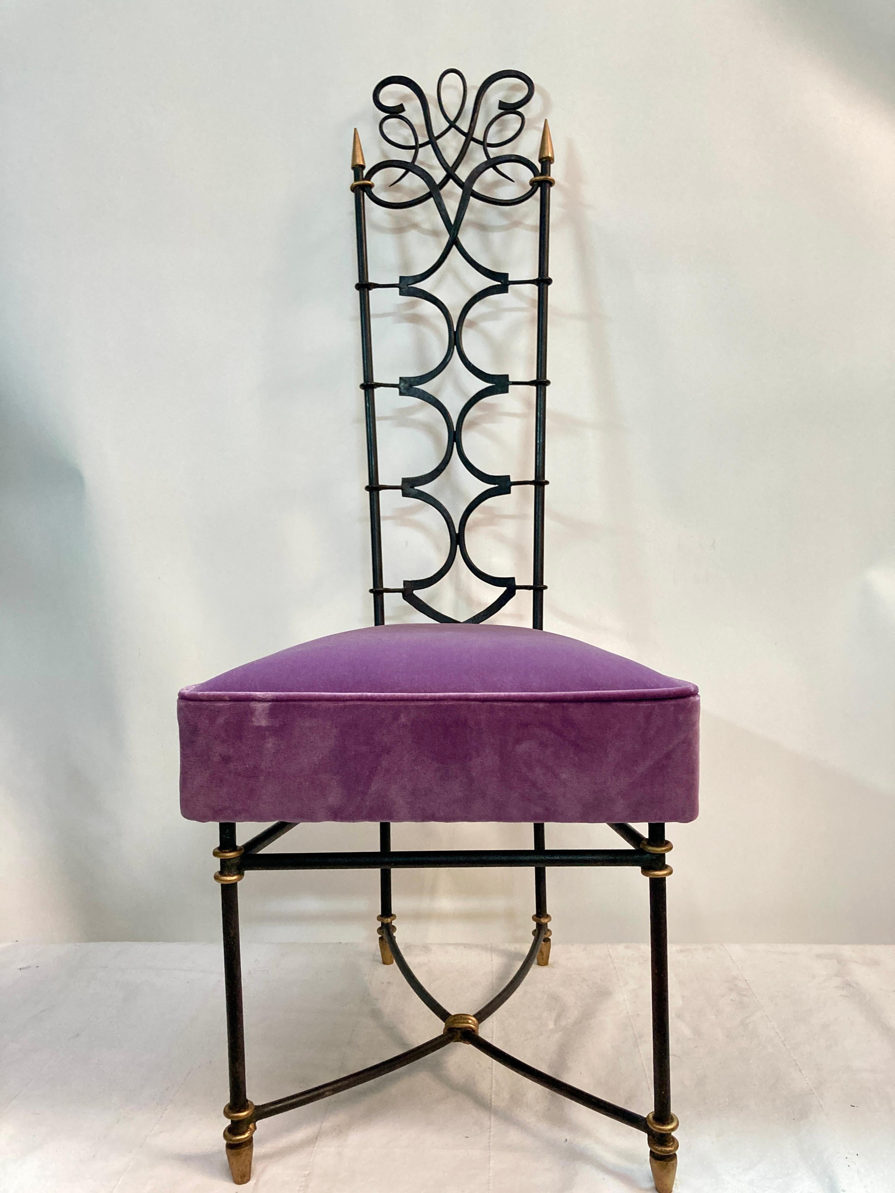 Very unusual pair of tall wrought iron chairs
upholstered with purple velvet
Great condition
France