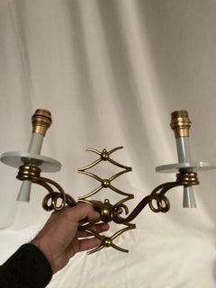 Pair of 1940's wrought iron sconces by René Prou