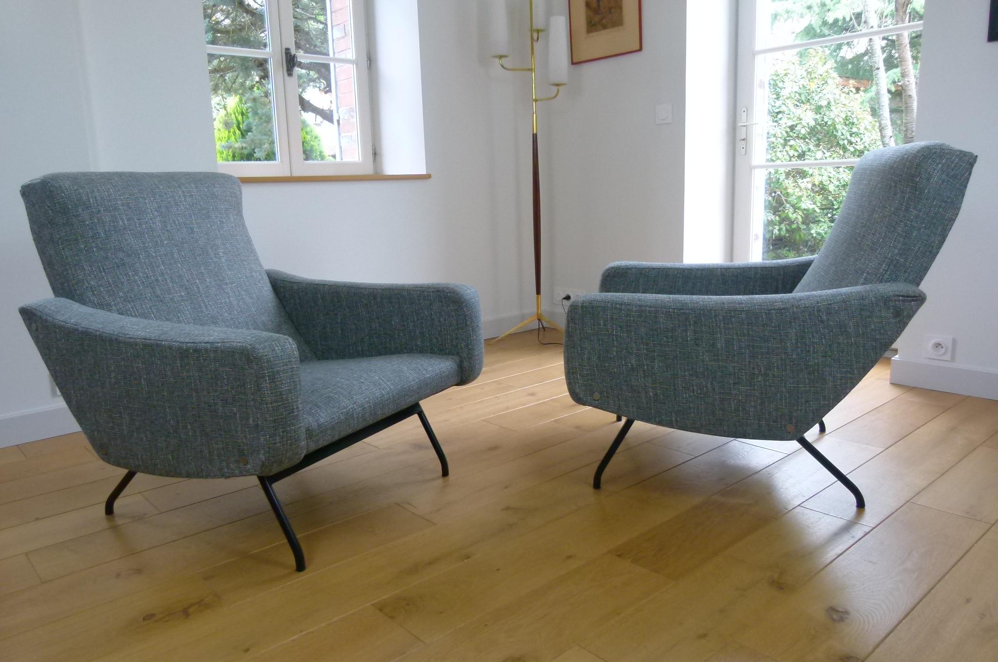 Pair of large armchairs, in blue gray fabric, black lacquered metal base.
These armchairs have been completely restored, with new fabric and new upholstery.
French work by Joseph-André Motte Steiner edition, 1950.
Perfect condition.
Possibility