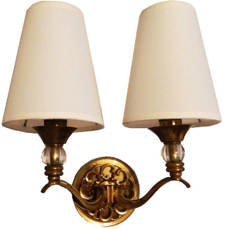 Superb pair of 1950 French sconces, one glass ball on each arm and a glass disc on the central medallion. US rewired and in working condition. 60 watts bulb max. Backplate: 4.75' diam.
Have a look on our the largest collection of French and Italian