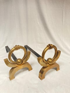 Pair of 1950's andirons attributed to Jacques Adnet