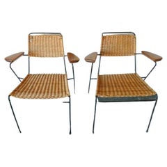 Pair of 1950s Armchairs in Black Metal and Rattan