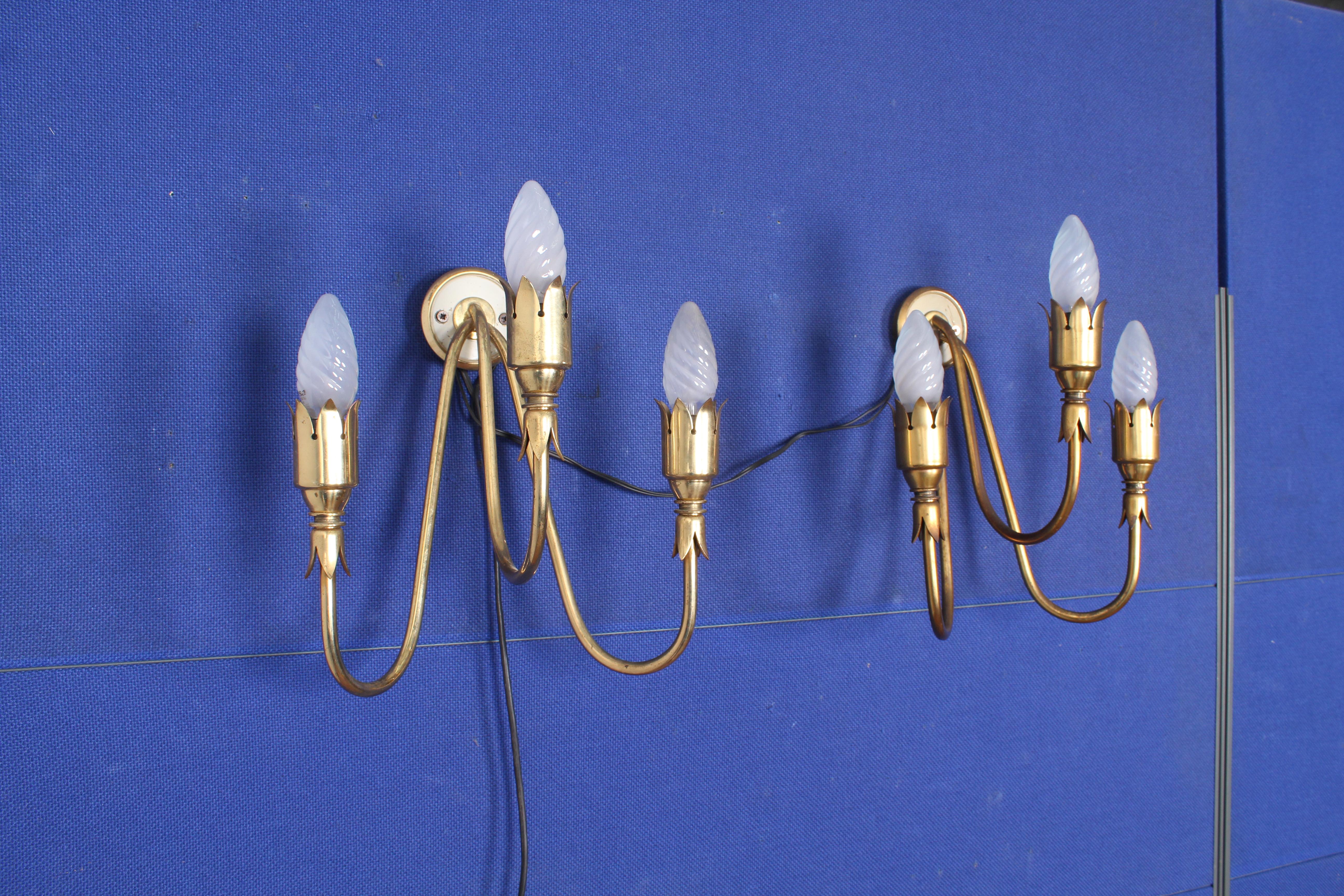 Pair of Italian Sconces  of Arredoluce. Mounted of brass frames with original patina. Three light sockets per sconce.
Wear consistent with age and use.