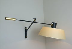 Pair of 1950s Articulated Sconce by Maison Lunel