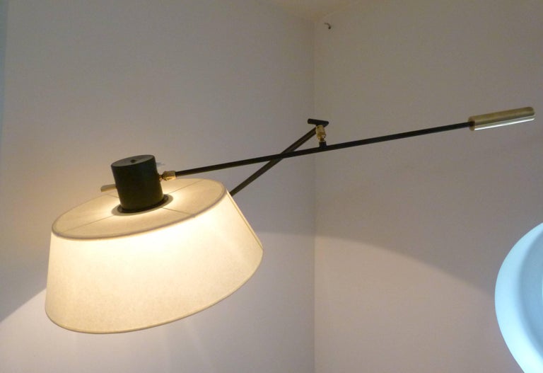 Mid-Century Modern Pair of 1950s Articulated Sconce by Maison Lunel For Sale