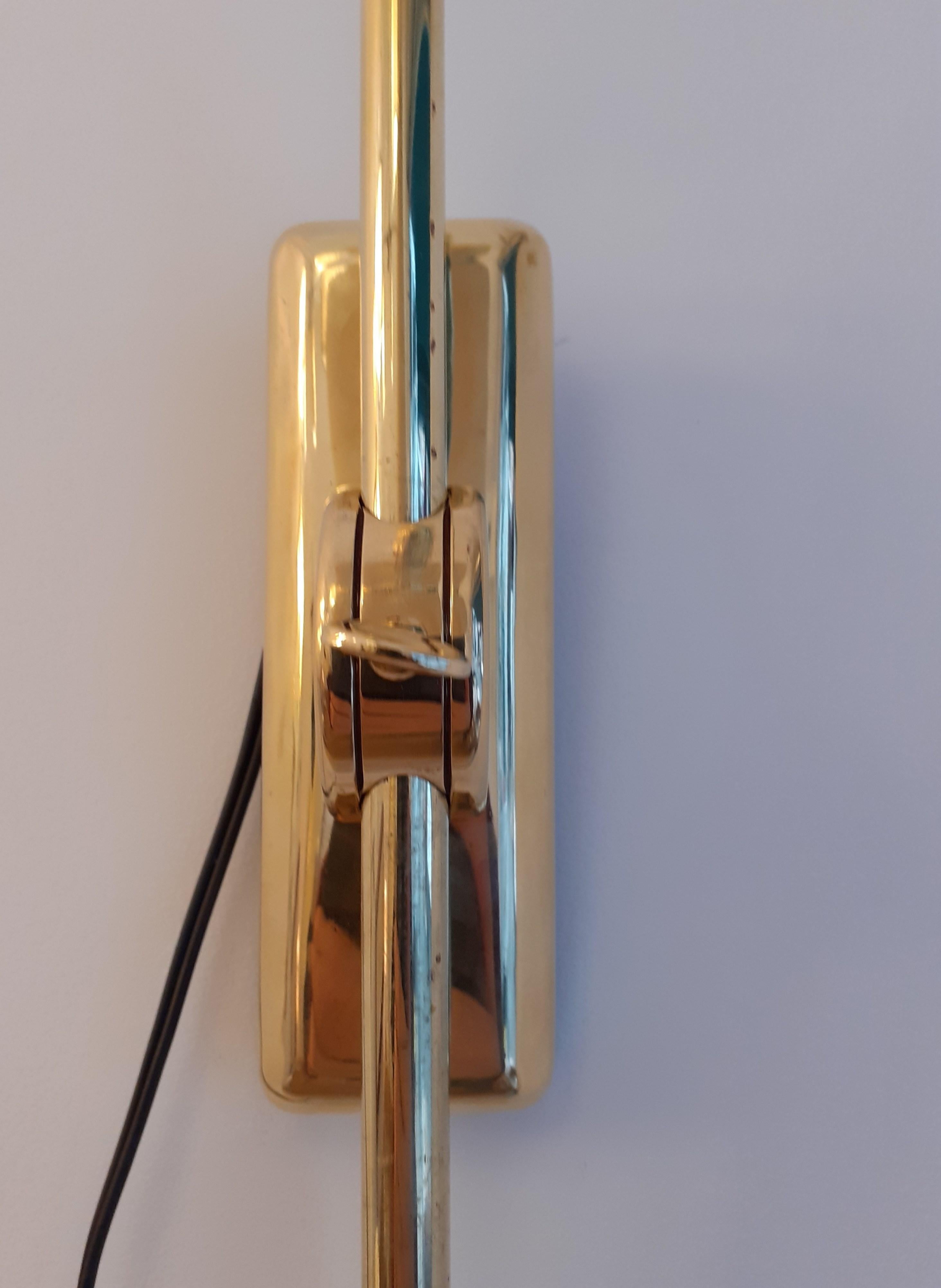 Brass Pair of 1950s Articulated Wall Lights by Maison Lunel