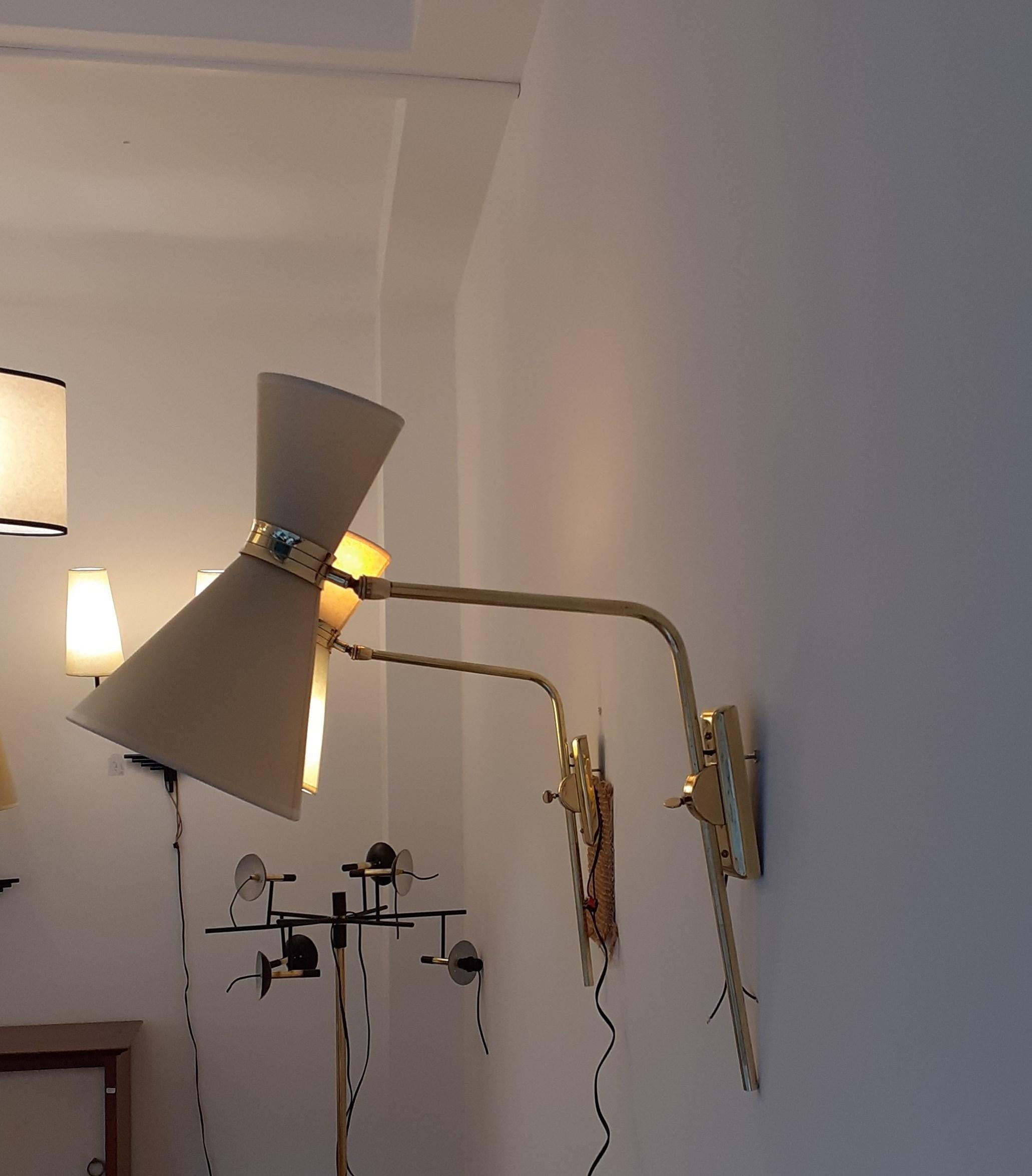 Pair of 1950s Articulated Wall Lights by Maison Lunel 1