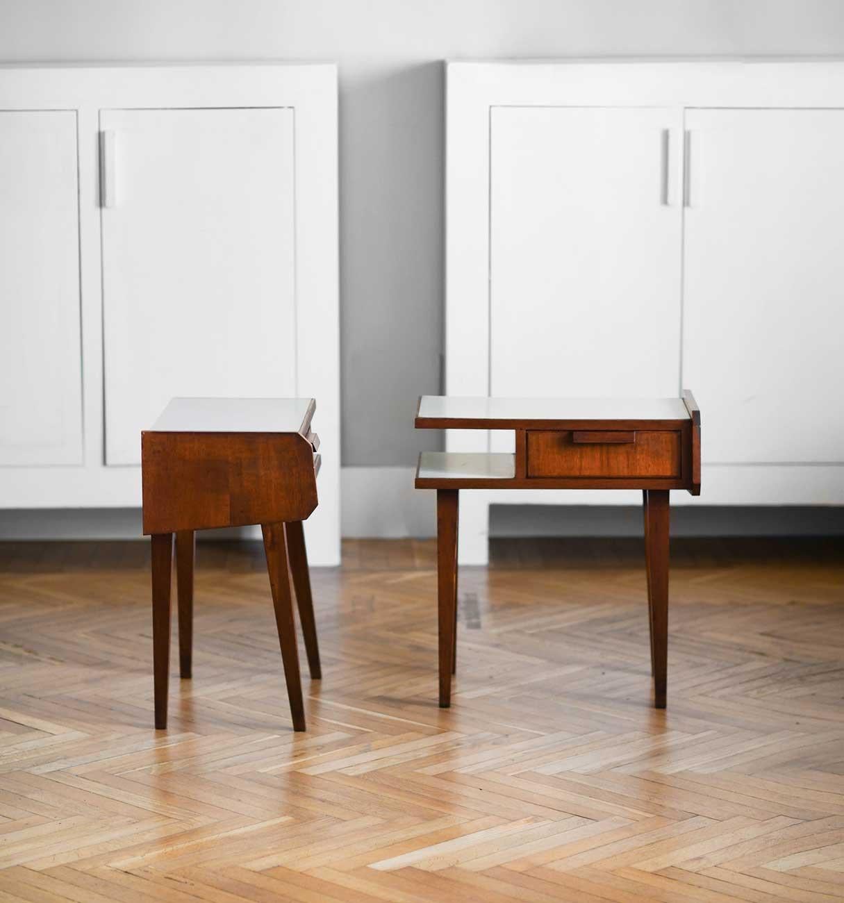 Pair of 1950s vintage bedside tables made of wood with formica shelves.
Italian manifacture, 1950s.