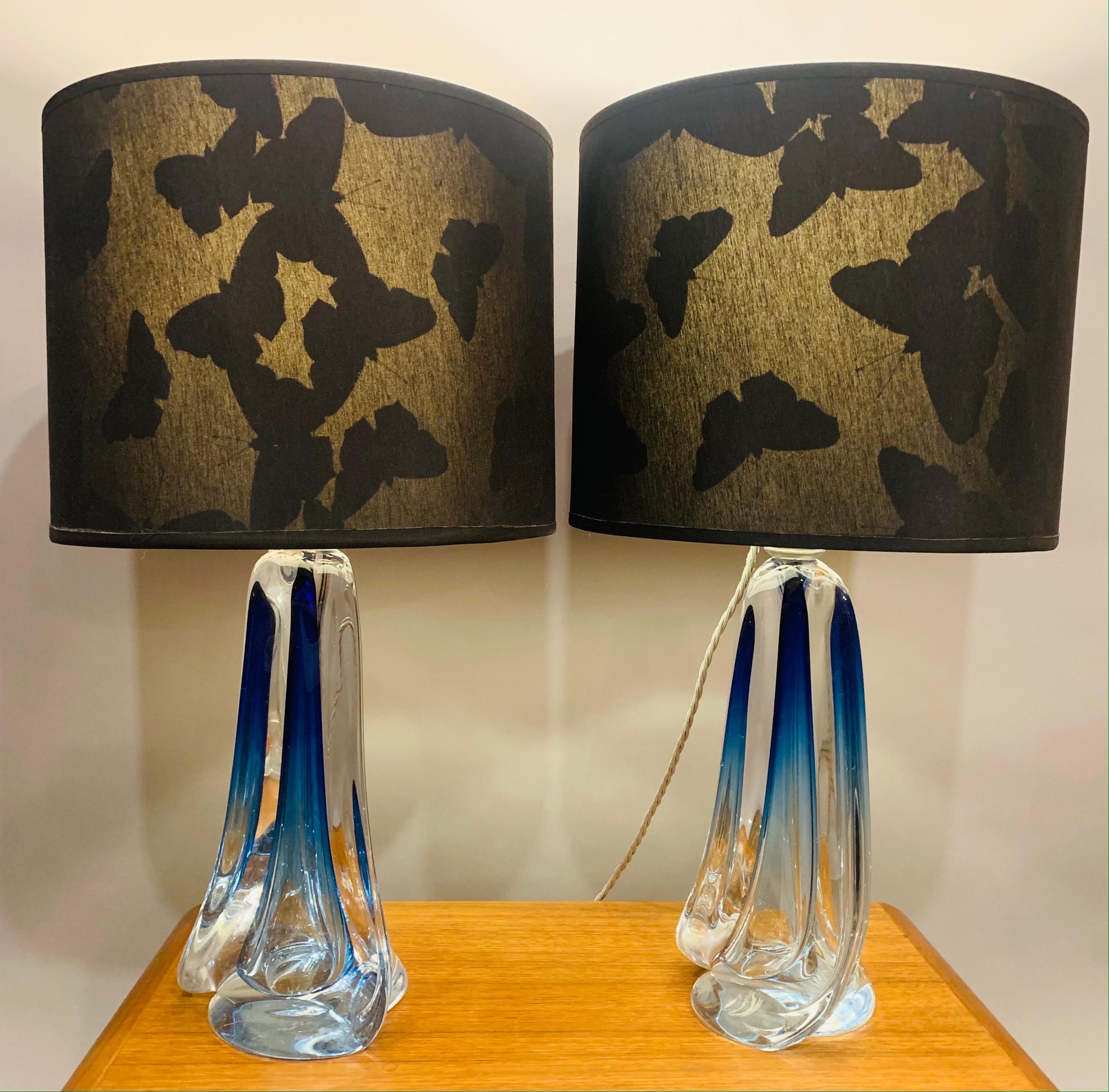 Pair of 1950s Belgium Val Saint Lambert blue and clear crystal glass table lamp bases with an interesting tapering geometric form. Both lamps have been rewired with a chrome bayonet socket with a silver twisted silk flex. Val St Lambert lamp bases