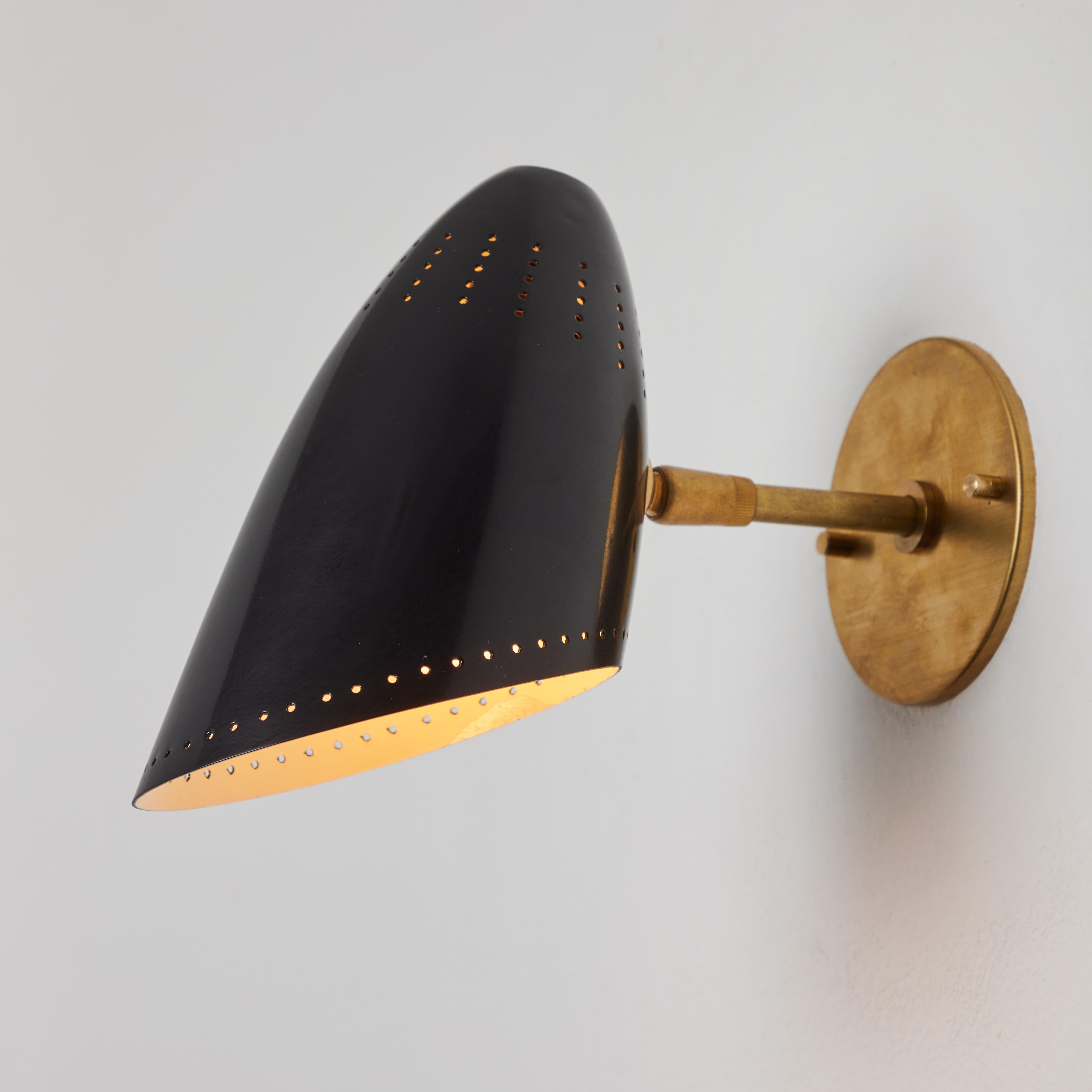 Mid-Century Modern Pair of 1950s Black Perforated Sconces Attributed to Jacques Biny For Sale