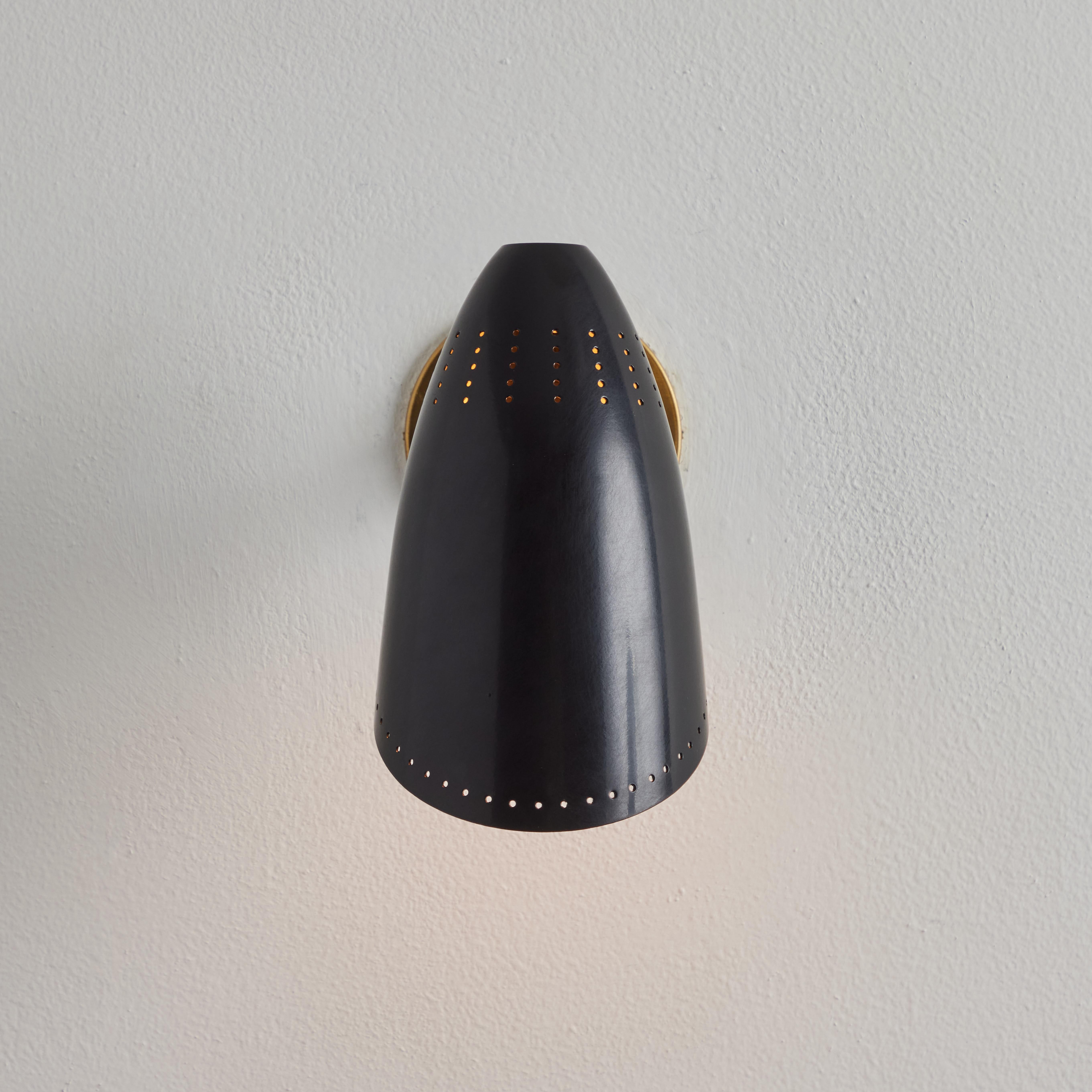 French Pair of 1950s Black Perforated Sconces Attributed to Jacques Biny For Sale