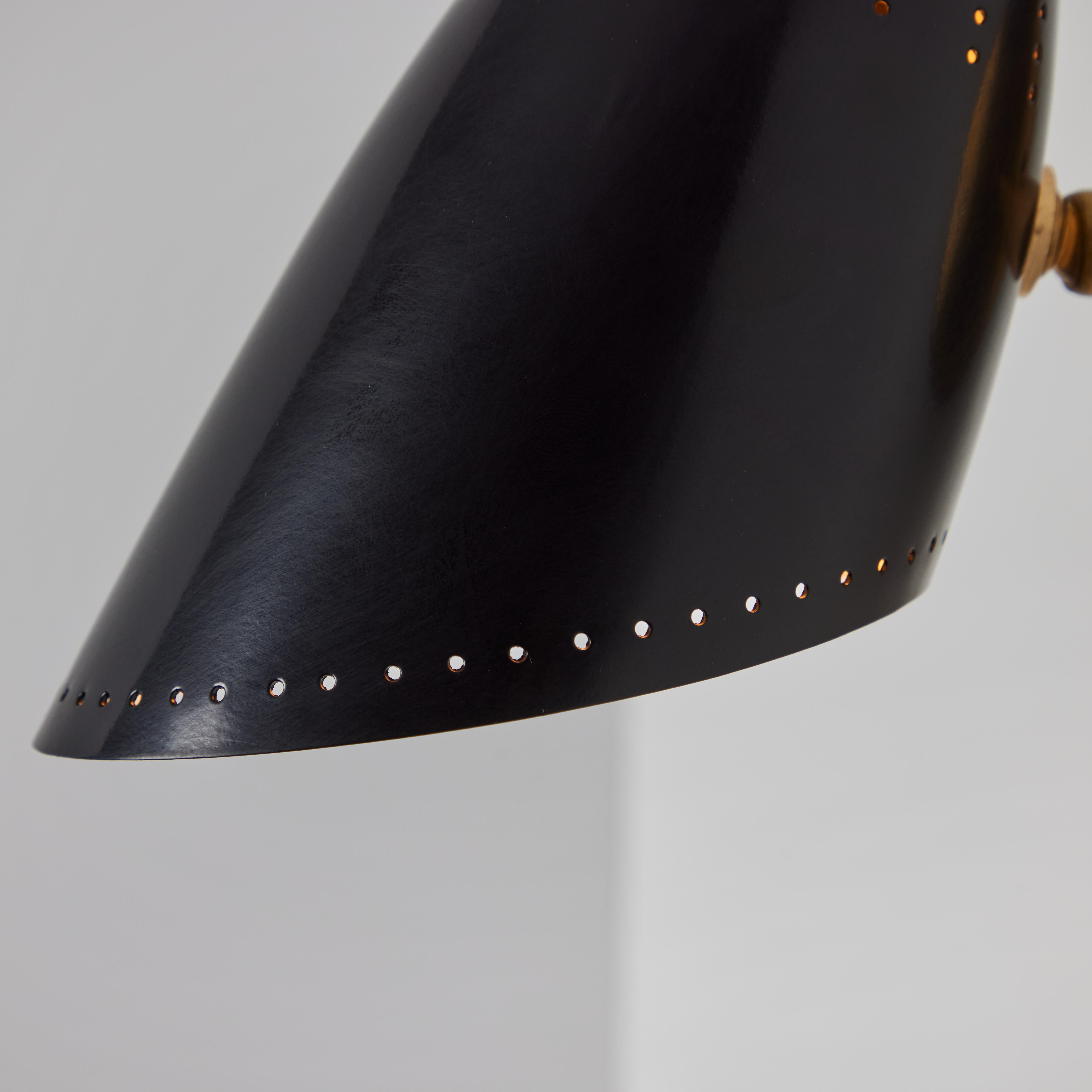 Pair of 1950s Black Perforated Sconces Attributed to Jacques Biny In Good Condition For Sale In Glendale, CA