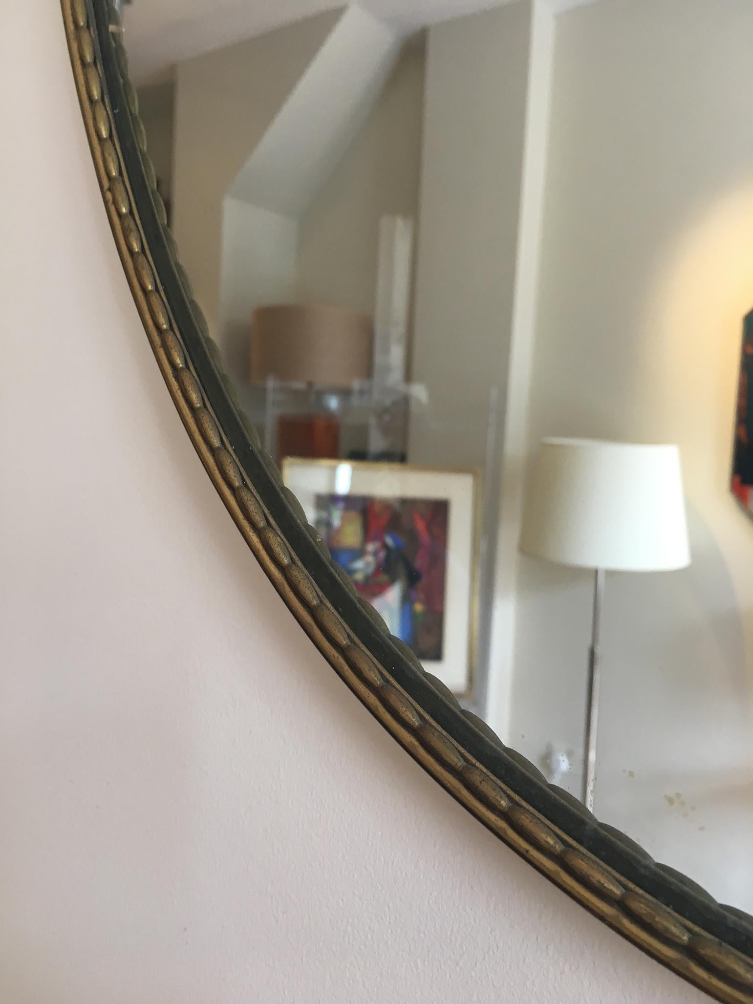 20th Century Pair of 1950s Brass Shield Shaped Mirrors, Italy