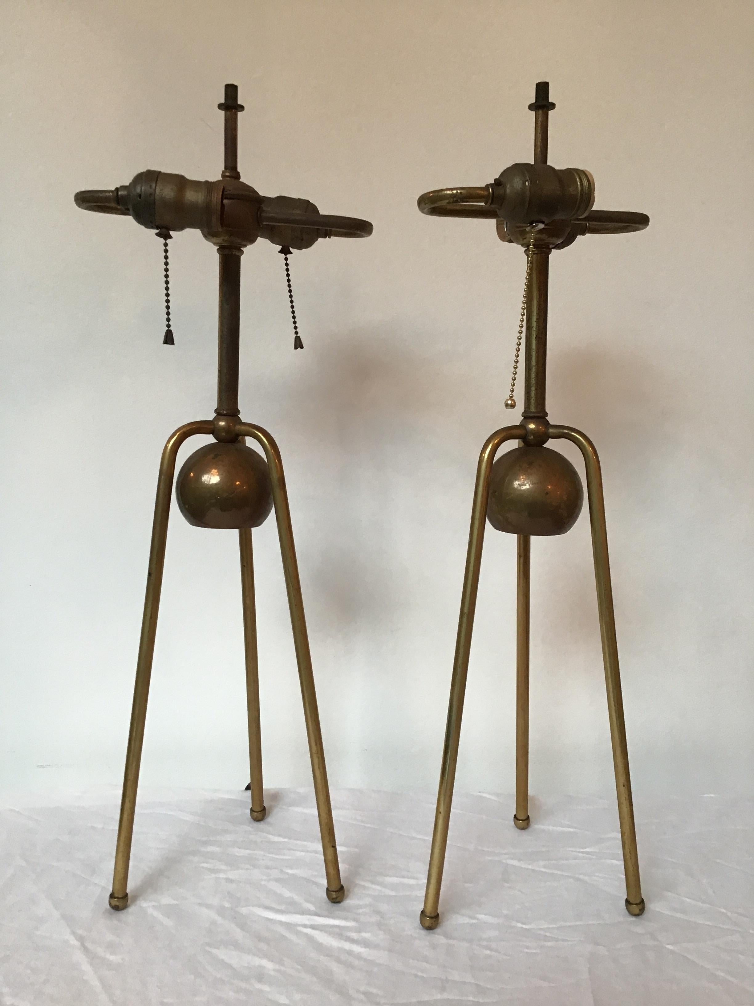 Pair of 1950s brass tri pod table lamps.