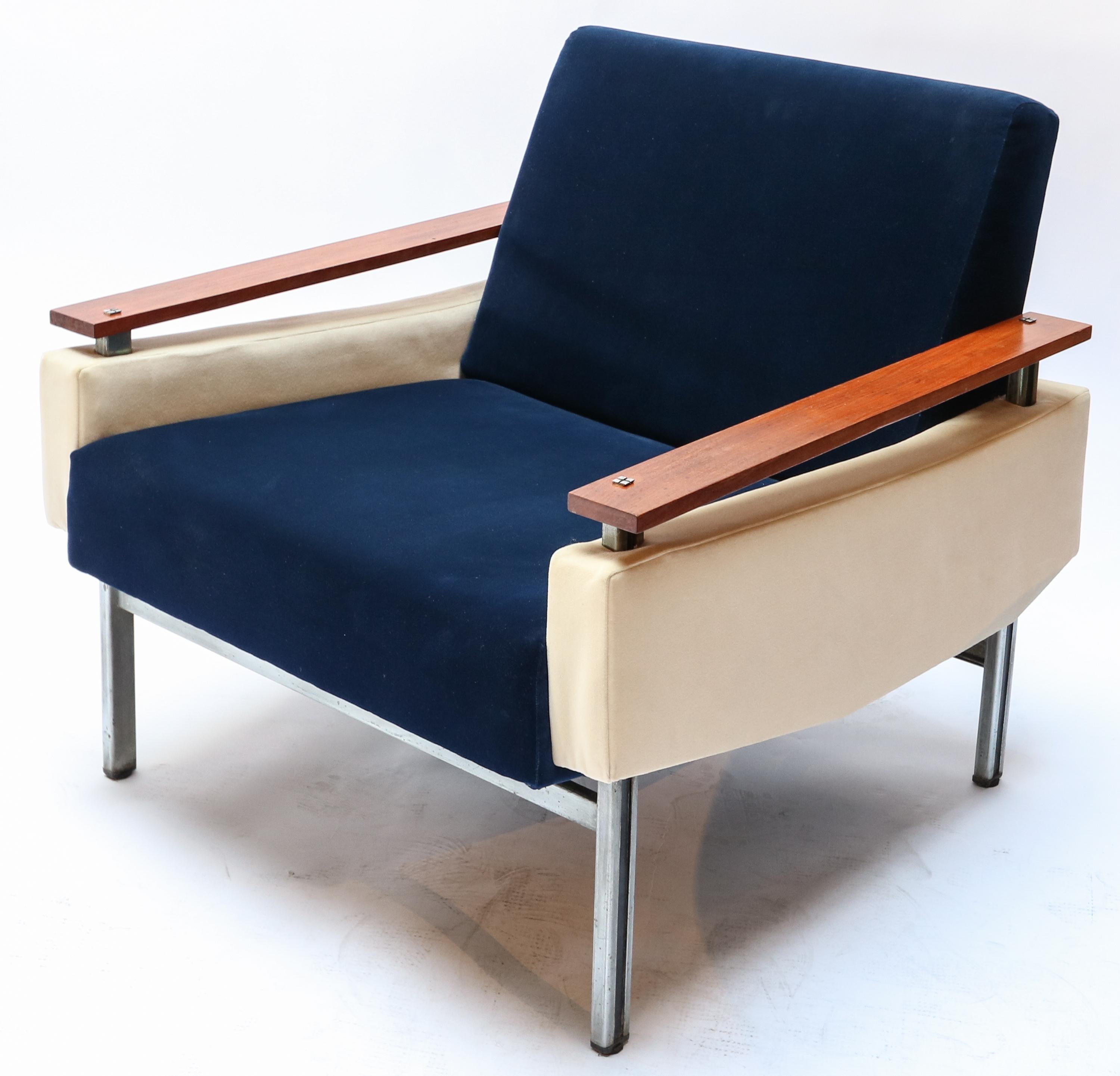 Pair of 1950s Brazilian armchairs with caviuna wood arms and upholstered with blue and beige velvet on a chrome frame.