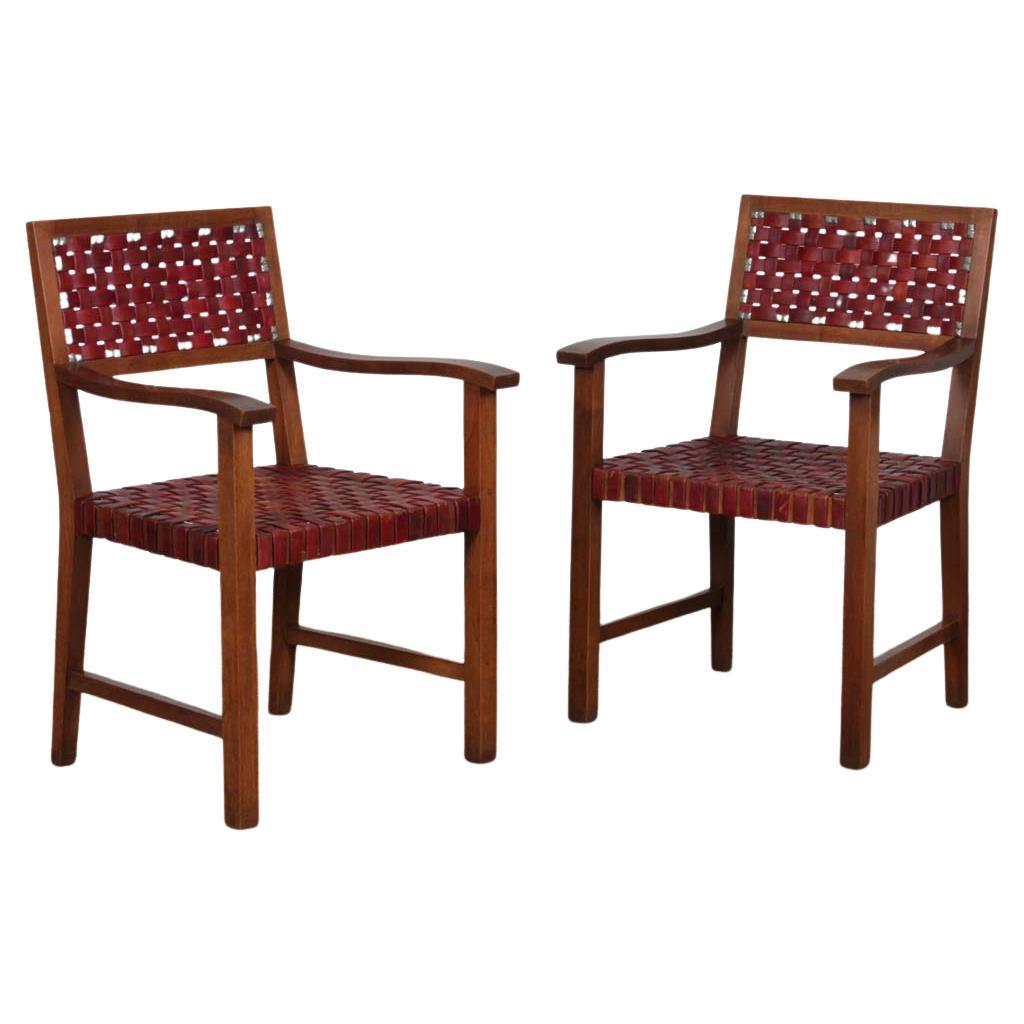 Pair of 1950s bridges armchairs in wood and leather in vendita