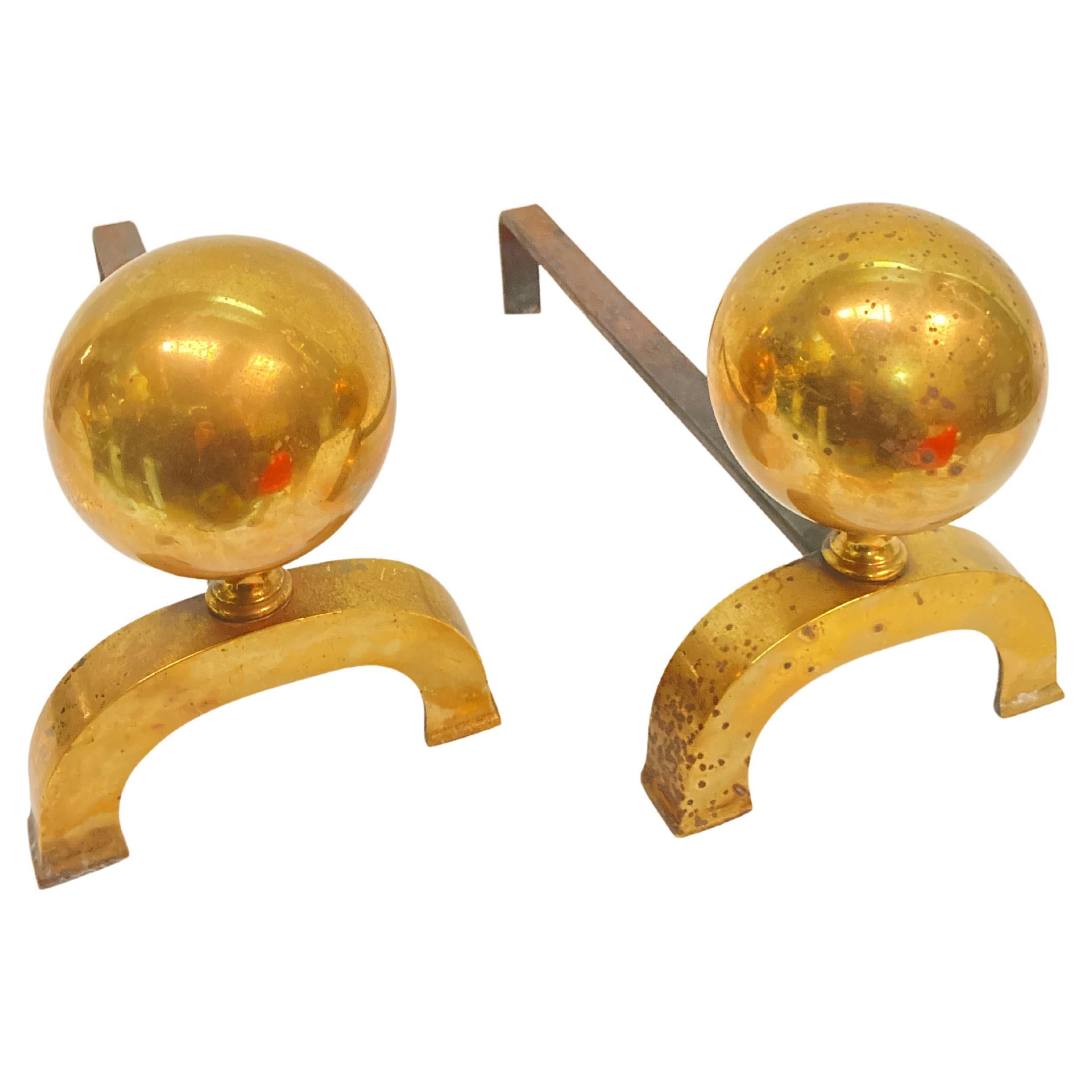 Pair of 1950's bronze andirons attributed to Jacques Adnet