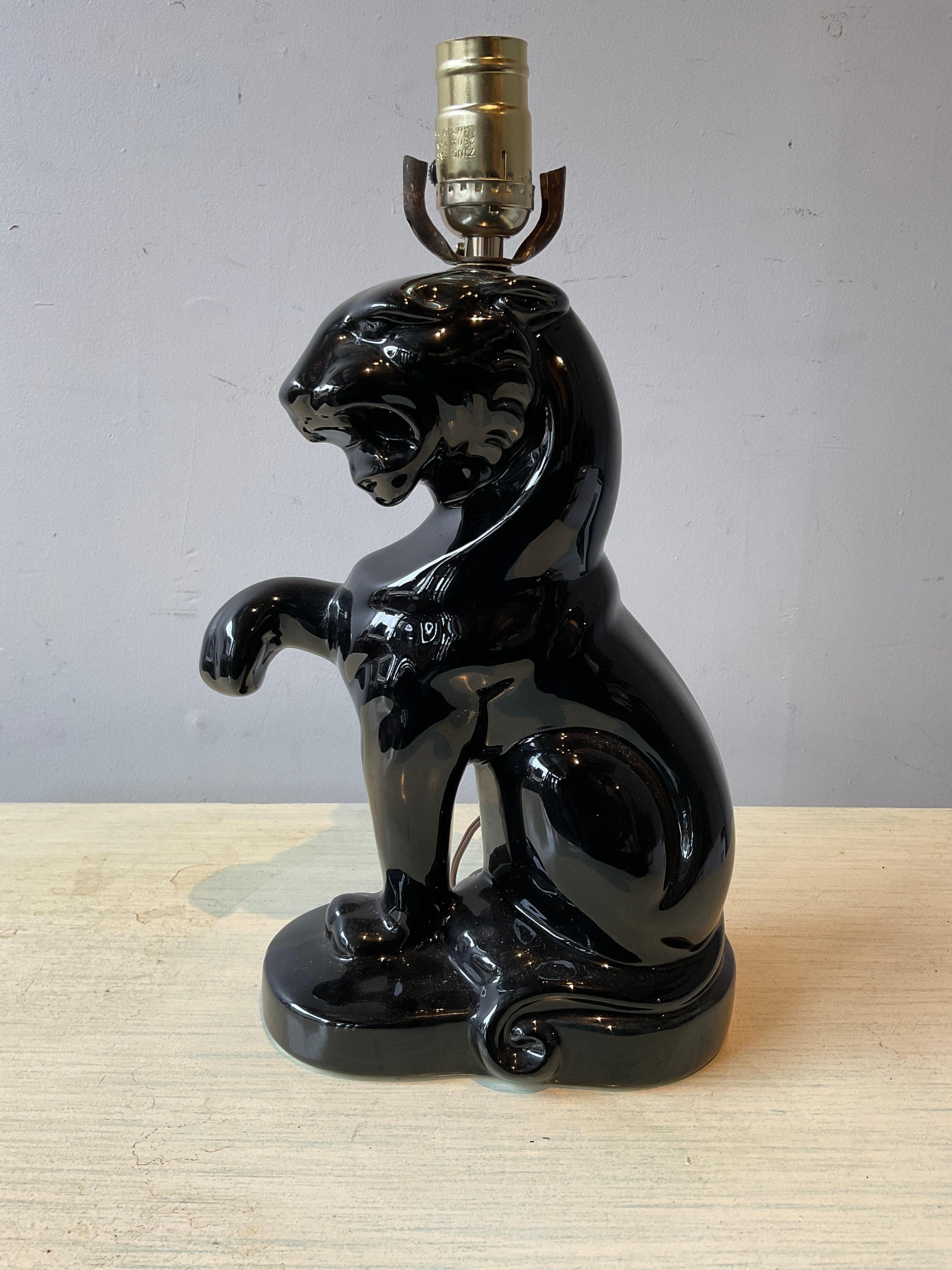Pair of 1950s ceramic black panther lamps Height is to top of socket. Lamps were rewired about 15 years ago, they need rewiring.