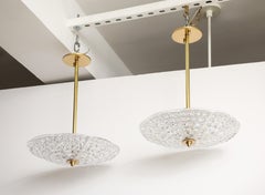 Pair of 1950's Crystal and Brass Chandeliers by Carl Fagerlund for Orrefors.