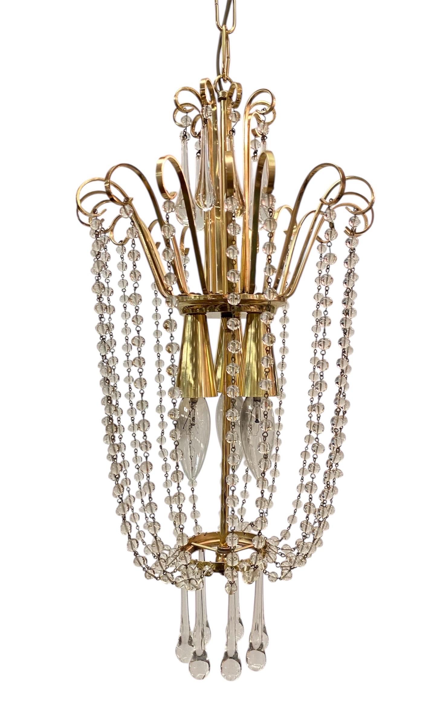 Pareja de lámparas de cristal y prismas de los años 50 Regencia de Hollywood en venta