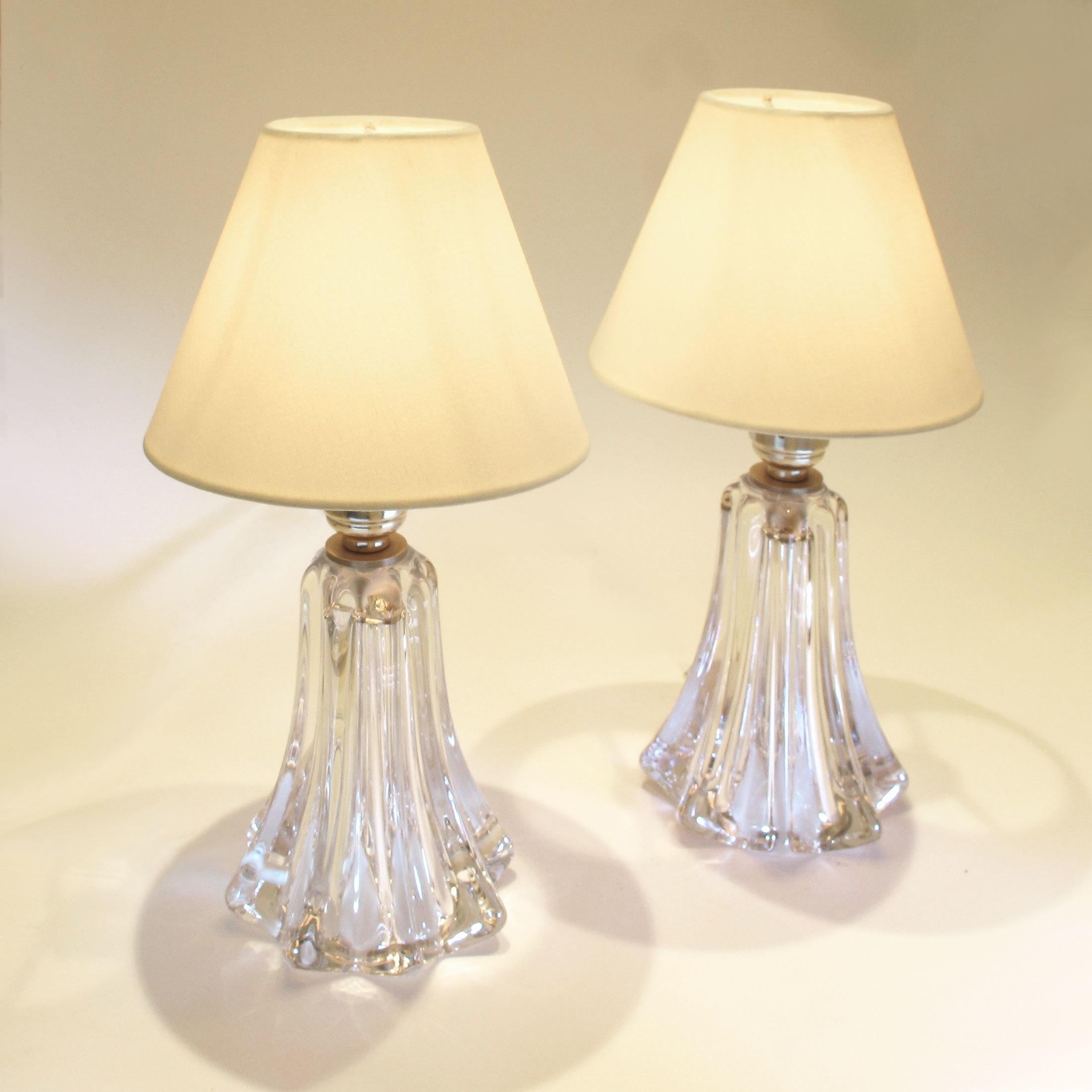 Pair of 1950s twisted crystal table lamps by the renowned Belgian crystal manufacturers.

Val Saint-Lambert was founded in 1826 by Francois Kemlin and quickly established itself, along with the British firm, Osler, as the best glass manufacturers