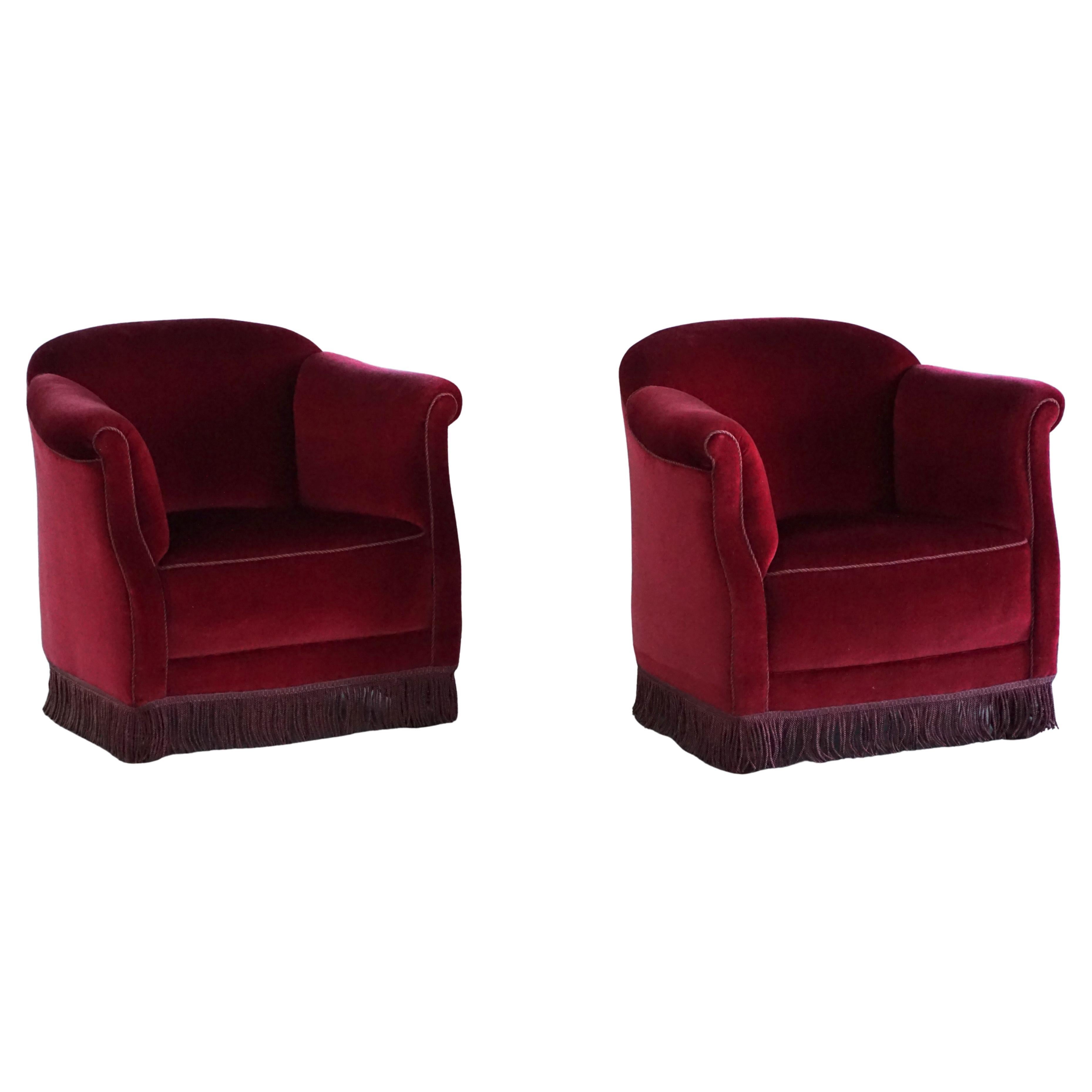 Pair of 1950s Danish Curved Lounge Chairs in Deep Red Velvet with Fringes For Sale