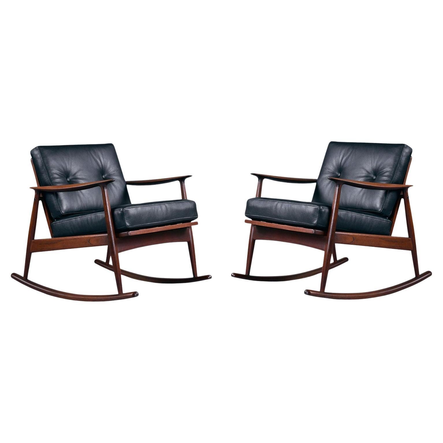 Pair of 1950's Danish Teak Rocking Chairs in Black Leather by Moreddi