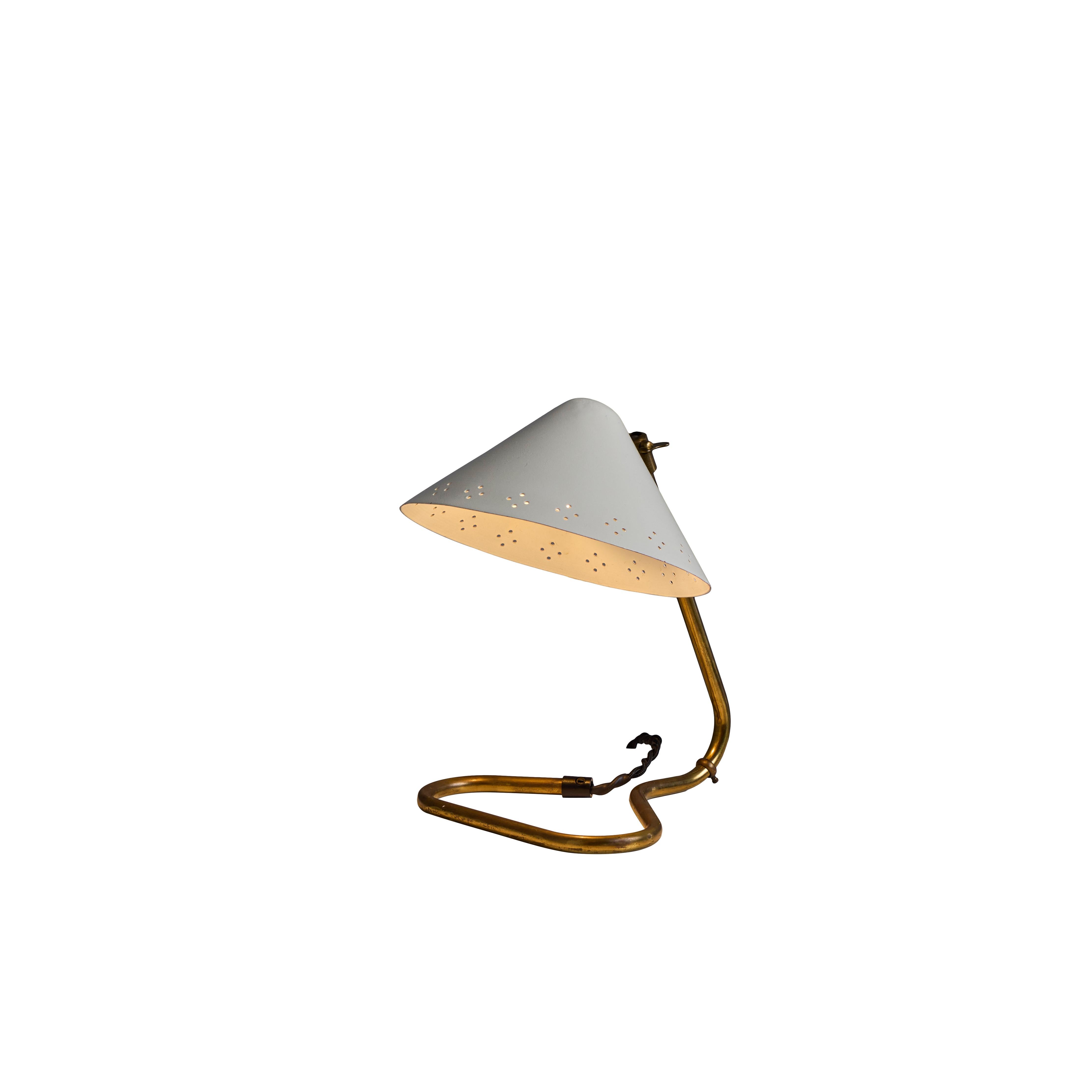 Pair of 1950s Erik Warna 'GK14' White and Brass Perforated Shade Table Lamps. 

Executed in perforated white painted metal and patinated brass. Shade is adjustable and can be rotate up or down. Produced by Gnosjö Konstsmide Rydahls in Sweden in the