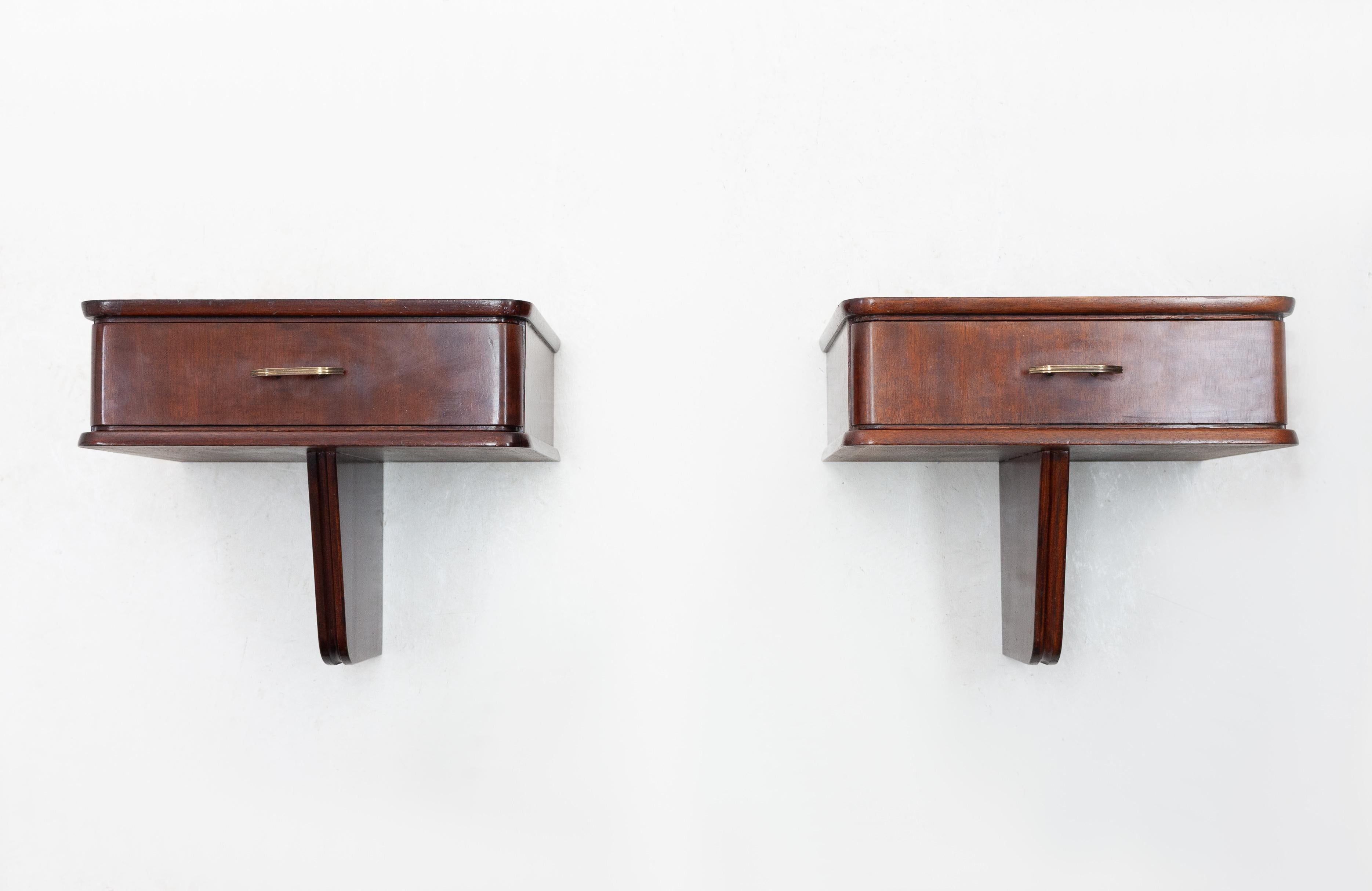 Two floating nightstands from the 1950s. Designed by Dutch architect and furniture maker Abraham A. Patijn. These floating night stands are a very nice example of his work and feature all curved and rounded corners.