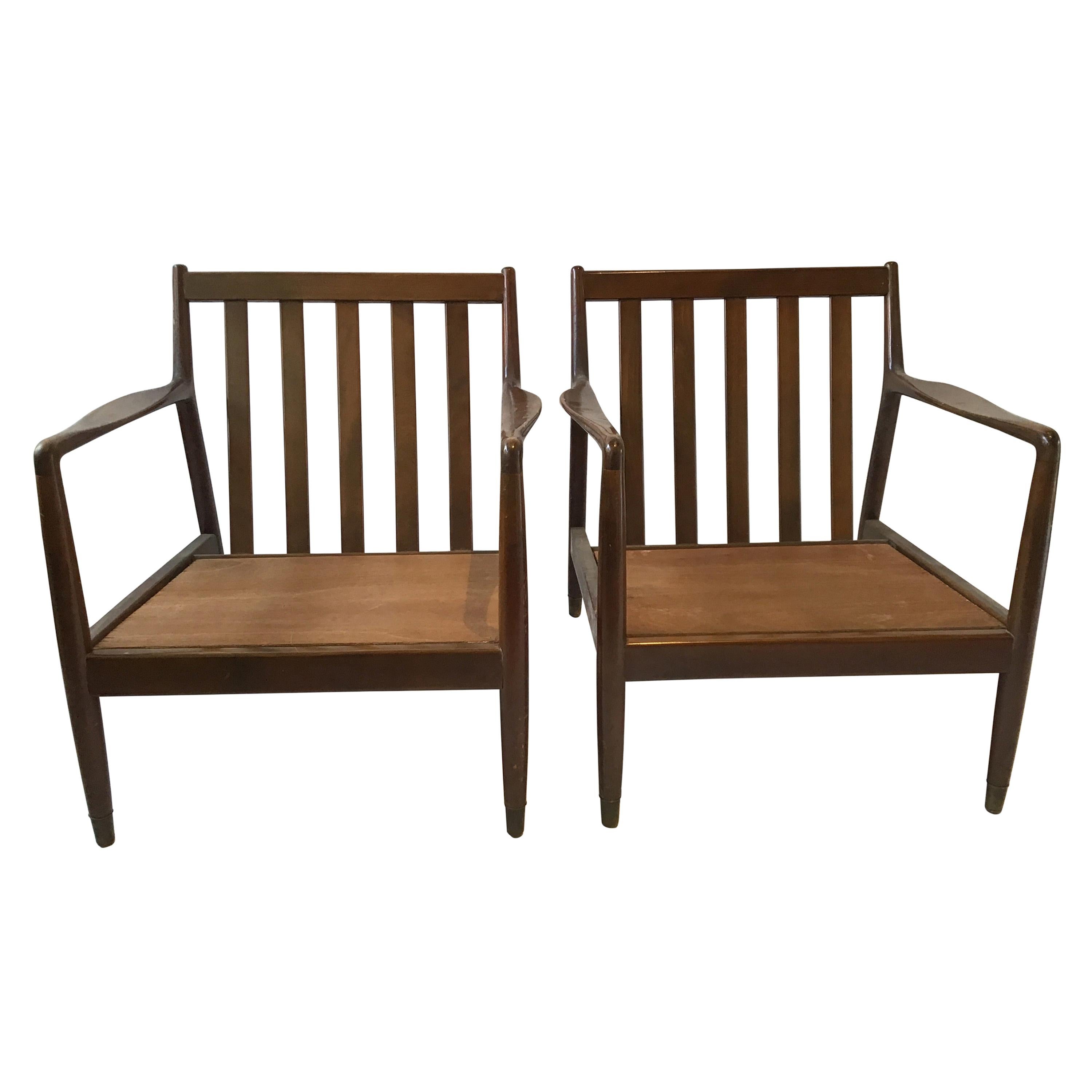 Pair of 1950s Folke Ohlsson Walnut Lounge Chairs for DUX