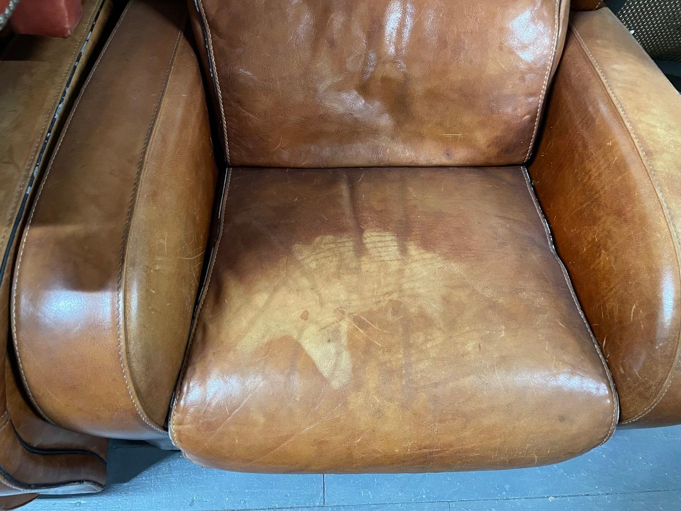 Mid-20th Century Pair of 1950s French Leather Lounge Chairs For Sale
