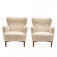 Pair of 1950's Fritz Hansen Sheepskin Easy Chairs Model 8010