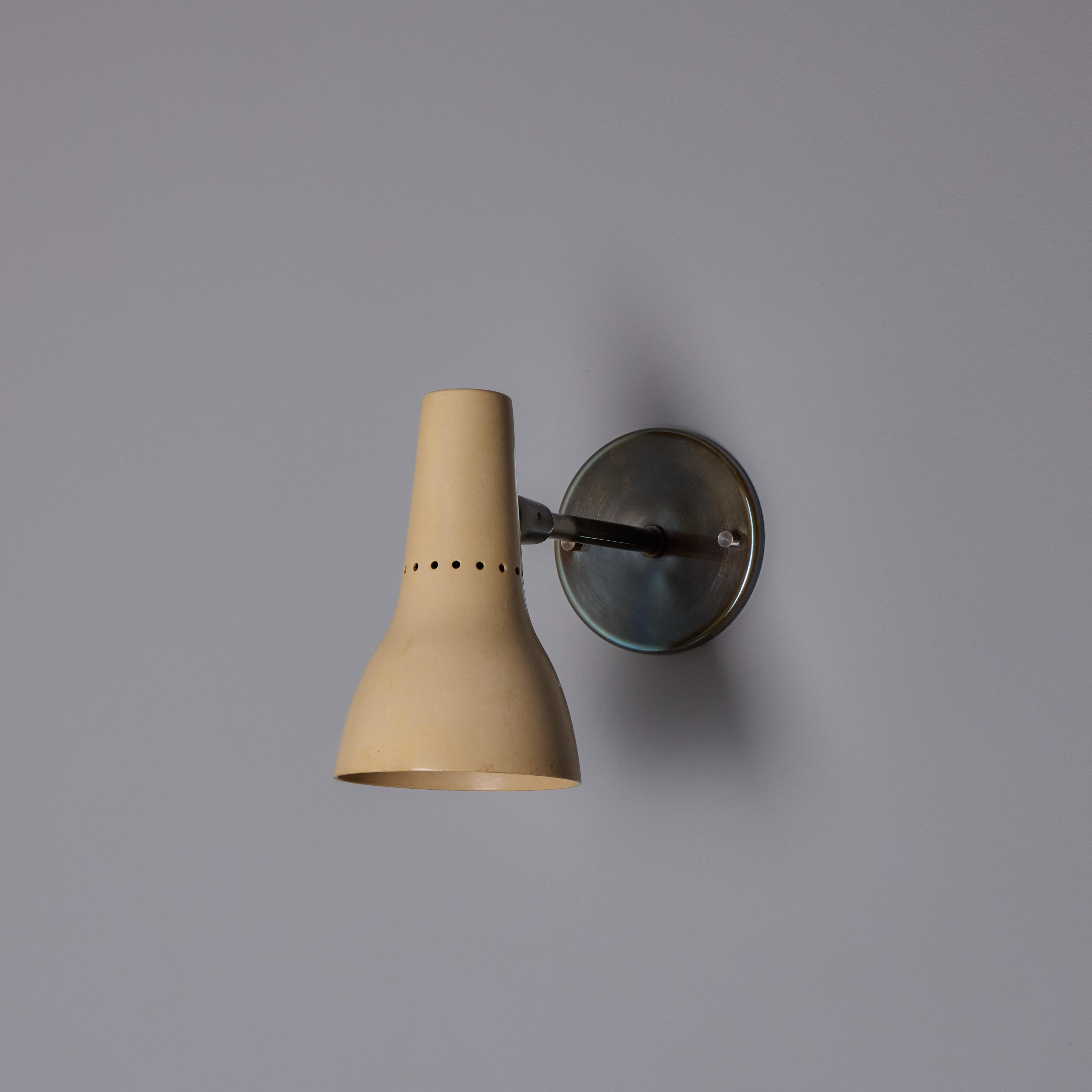 Italian Pair of 1950s Giuseppe Ostuni #109-1 'Tubetto 2 Snodi Piccoli' Sconces for Oluce For Sale